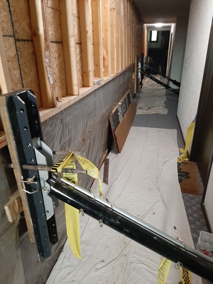 Exterior Deep Waterproofing System with Wall Push Back and Steel Beams Reinforcement by Toledo Basement Repair
