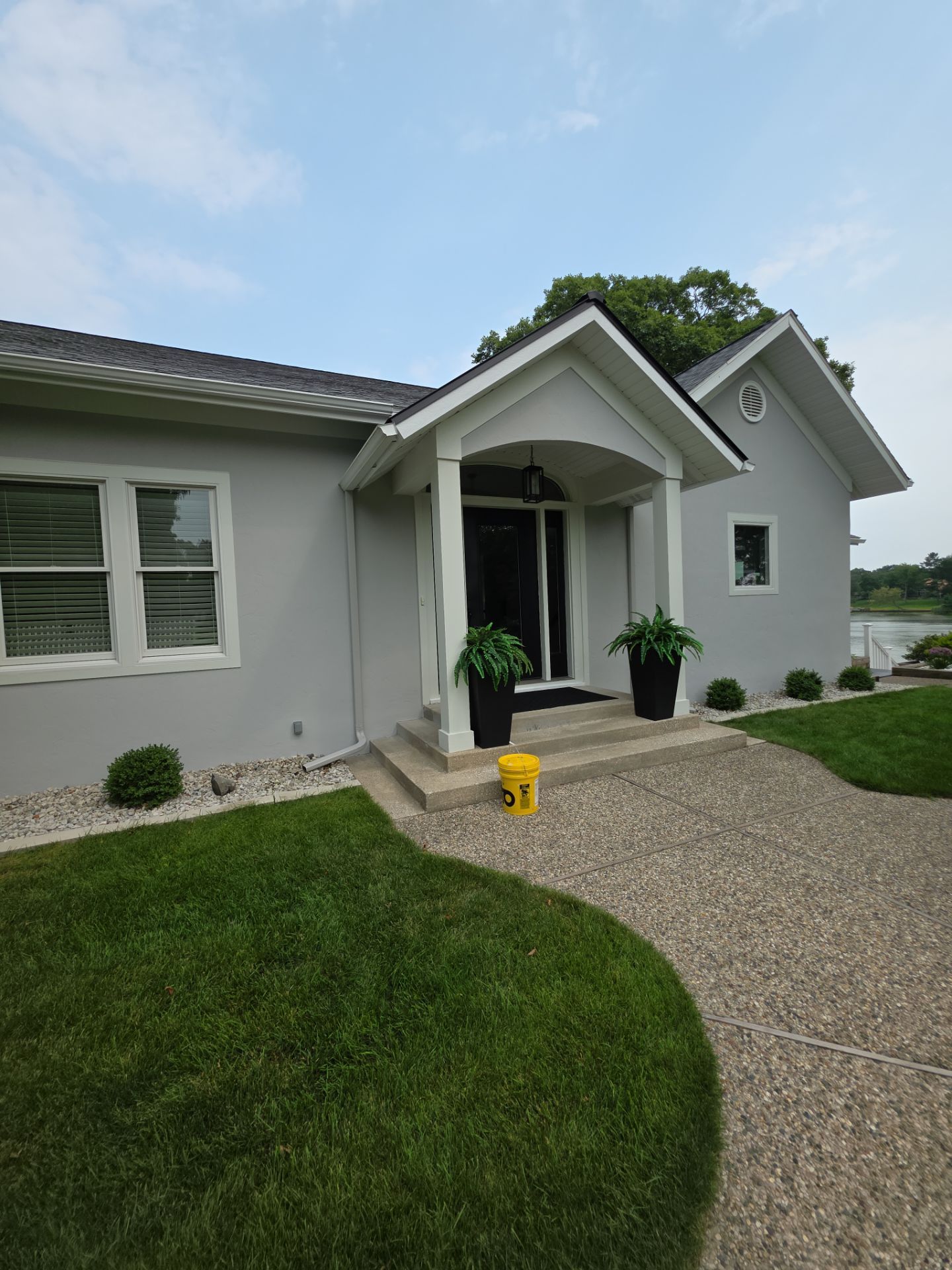 Norton Shores Residential Stucco Repair and Exterior Painting Refresh by Gordon Painting