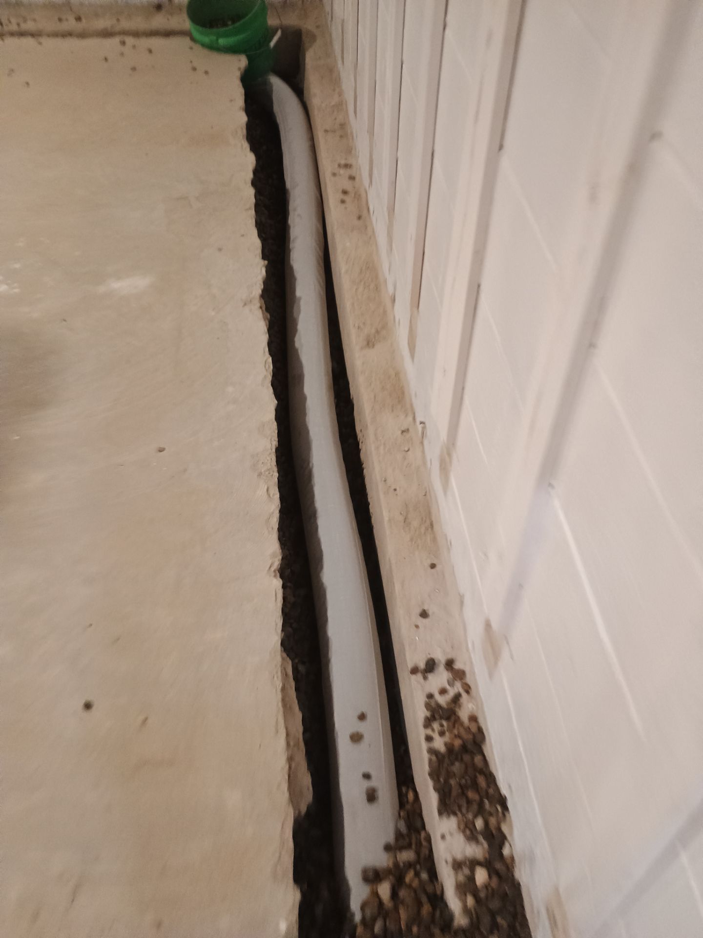 Interior Drain Tile & Buried Discharge in St. Anthony, MN by Waterproofing Northeast