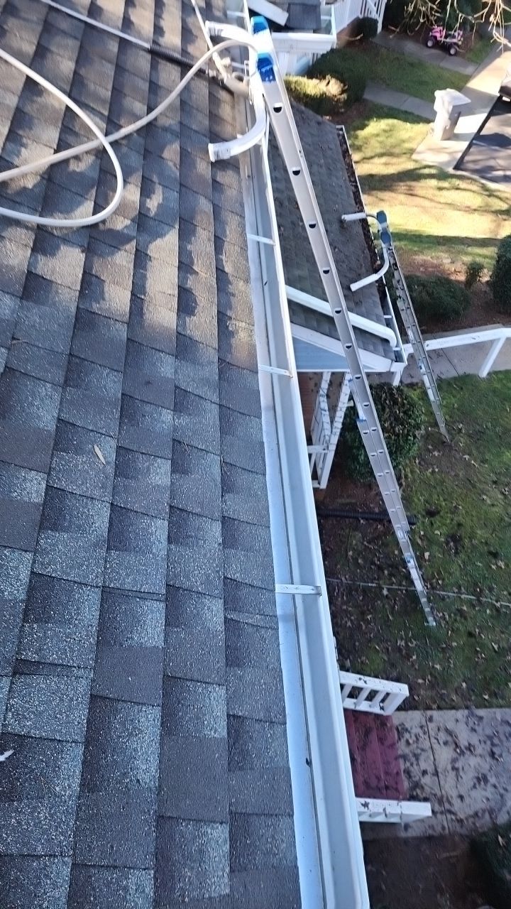 Gutter Cleaning using water by Power Wash Masters LLC