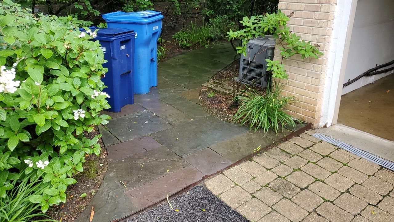 Bluestone patio cleaning by Northern Power Washing LLC.