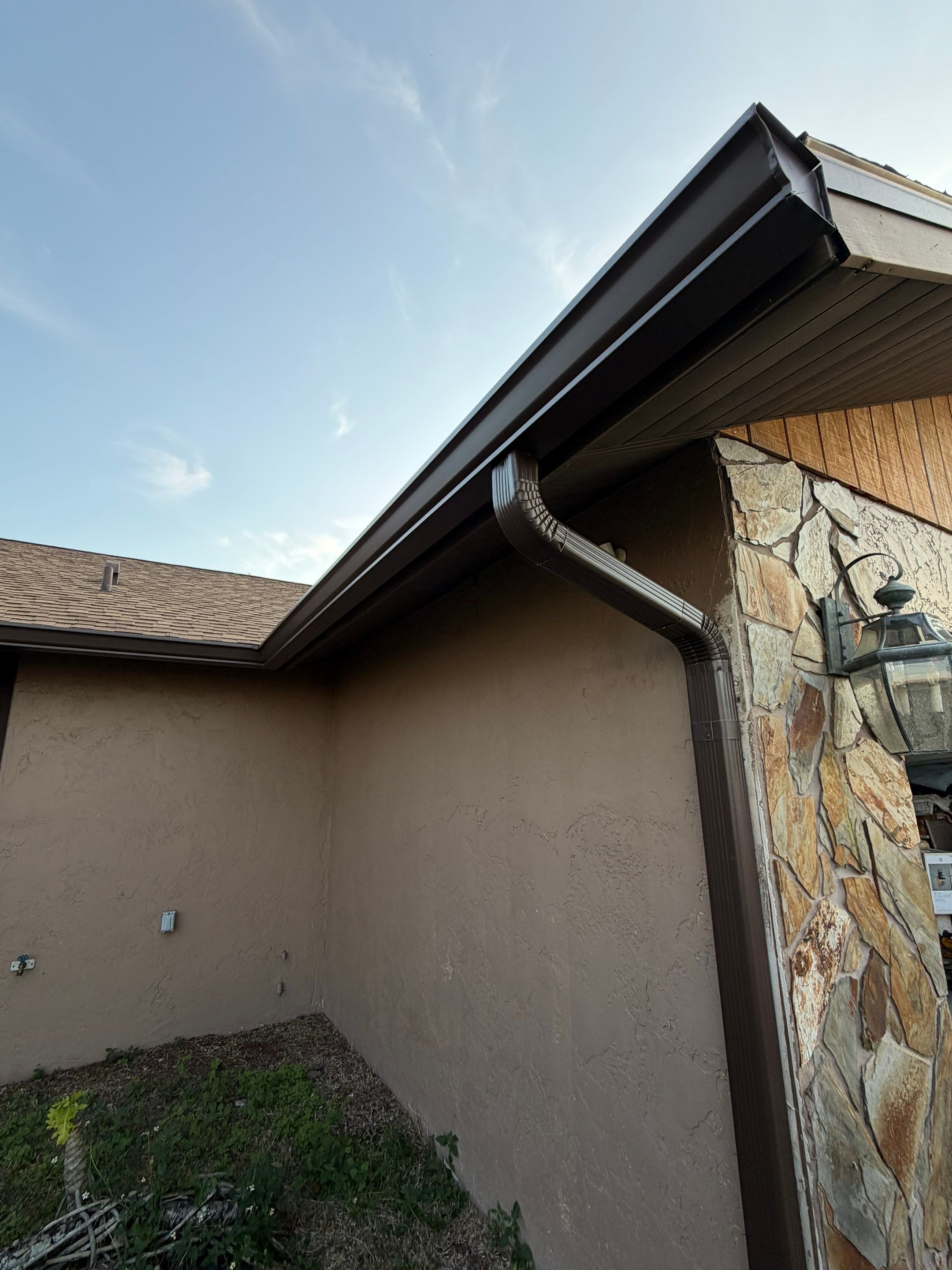 Brown Seamless Gutters for Beach Cottages in Sarasota FL by Gutter Professors