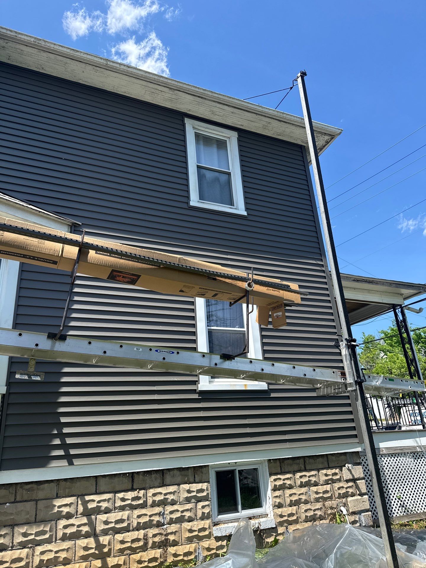 New siding & New Gutters by Alpha Design Services