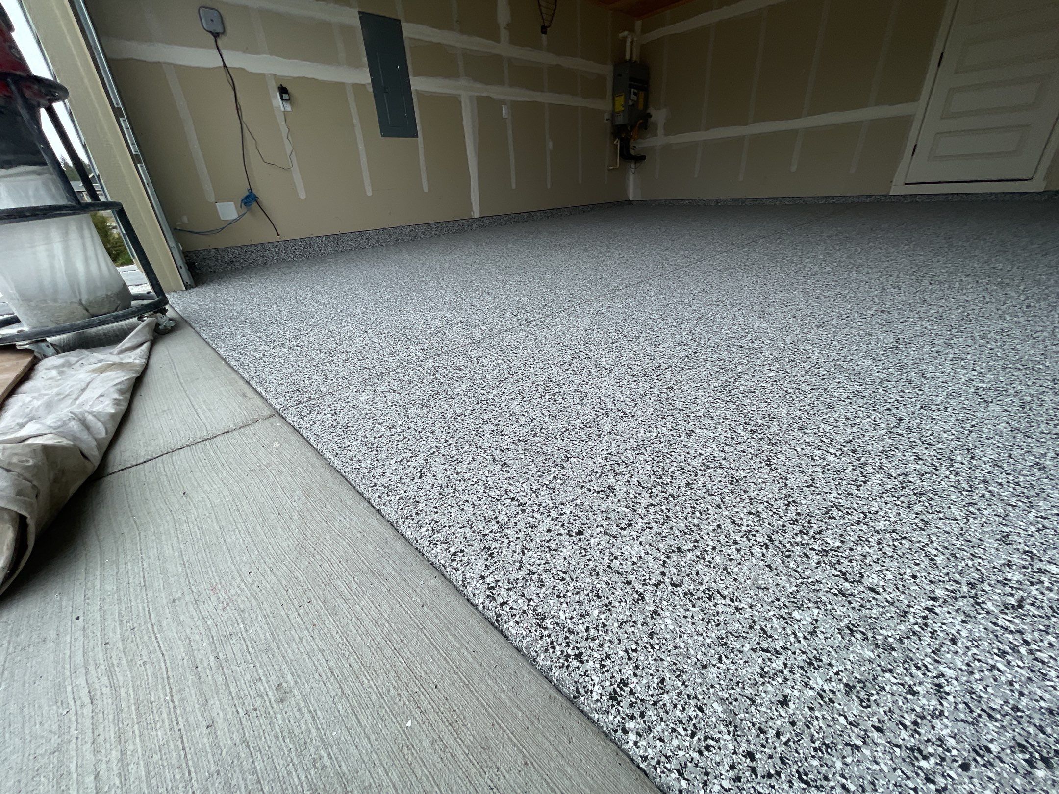 Garage Transformation using Domino by Croc Coatings, LLC