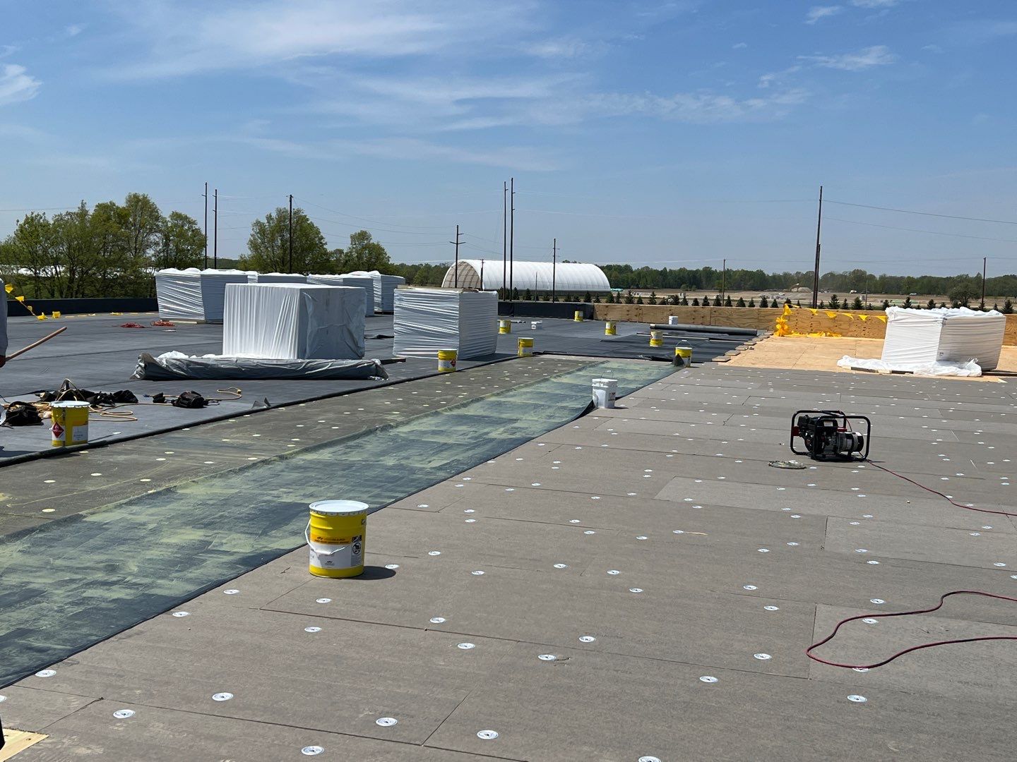 Commercial Roofing Installation using 60 mil rubber roof  by Nitro Roofing and Construction