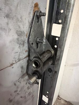 Sectional Garage Door Torsion Spring Replacement and Hardware Service