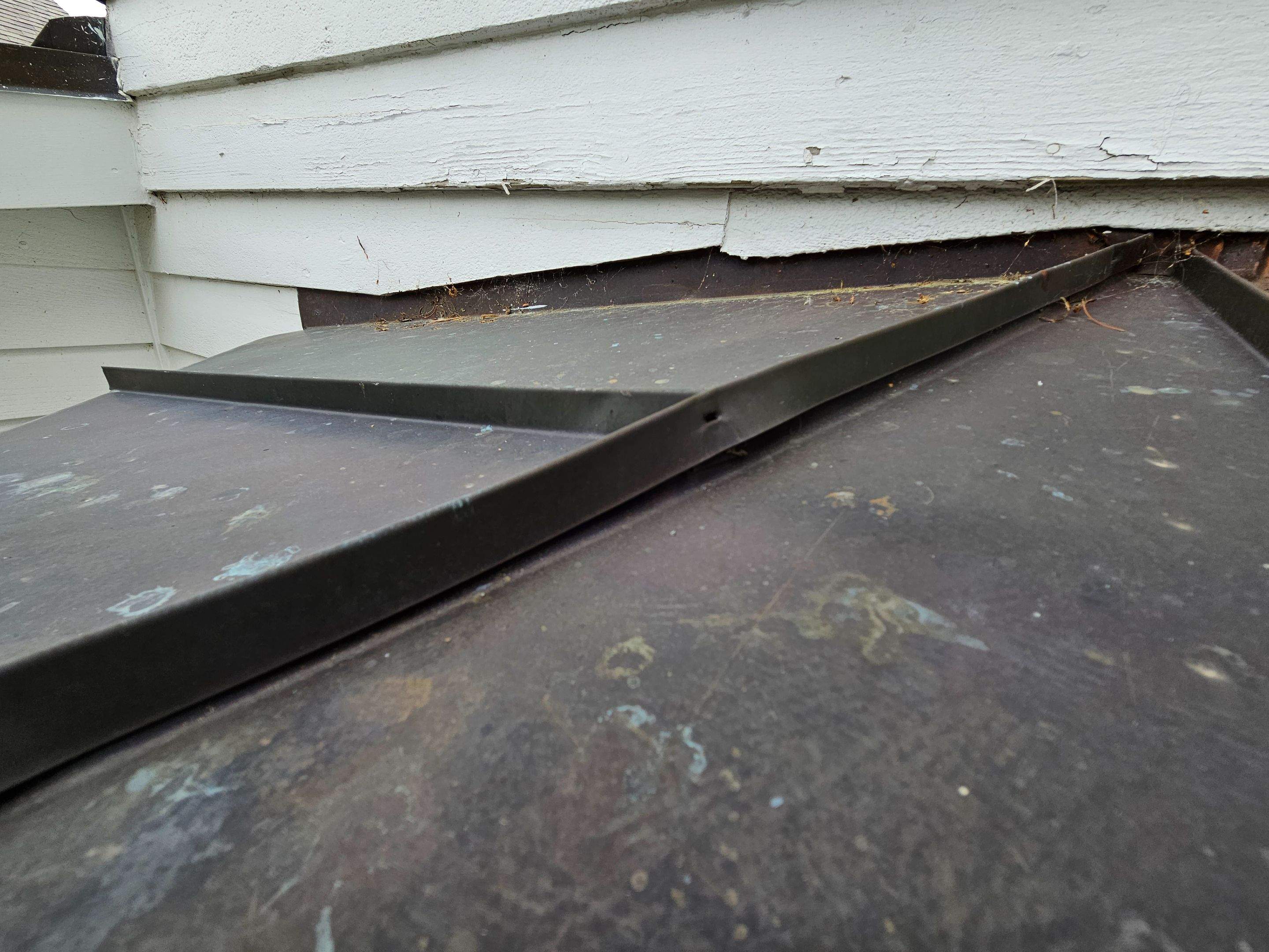 Copper Roof using Copper by Absolute Roofing and Construction