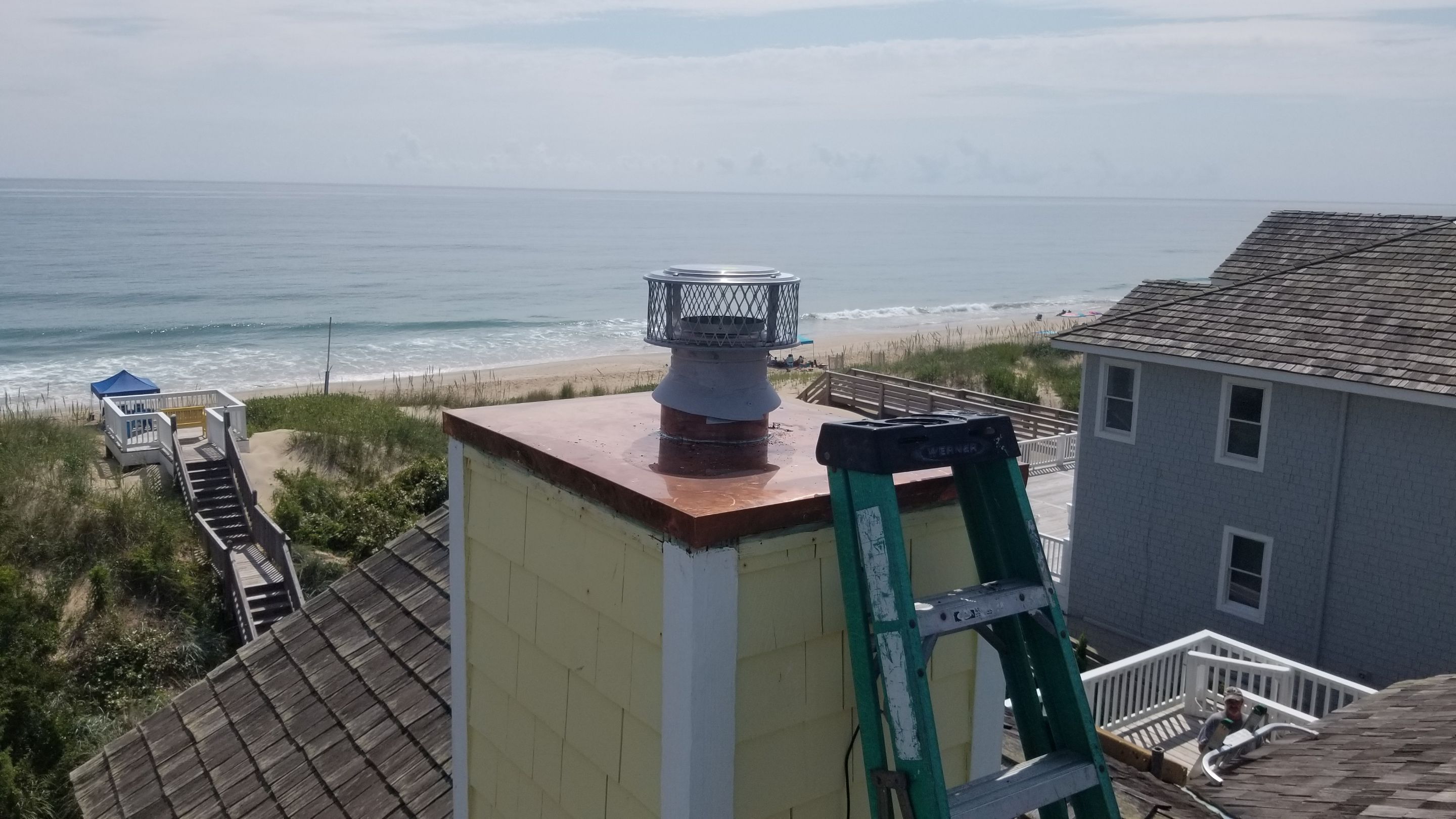 Chimney Chase using Copper by Gallop Roofing & Remodeling, Inc.