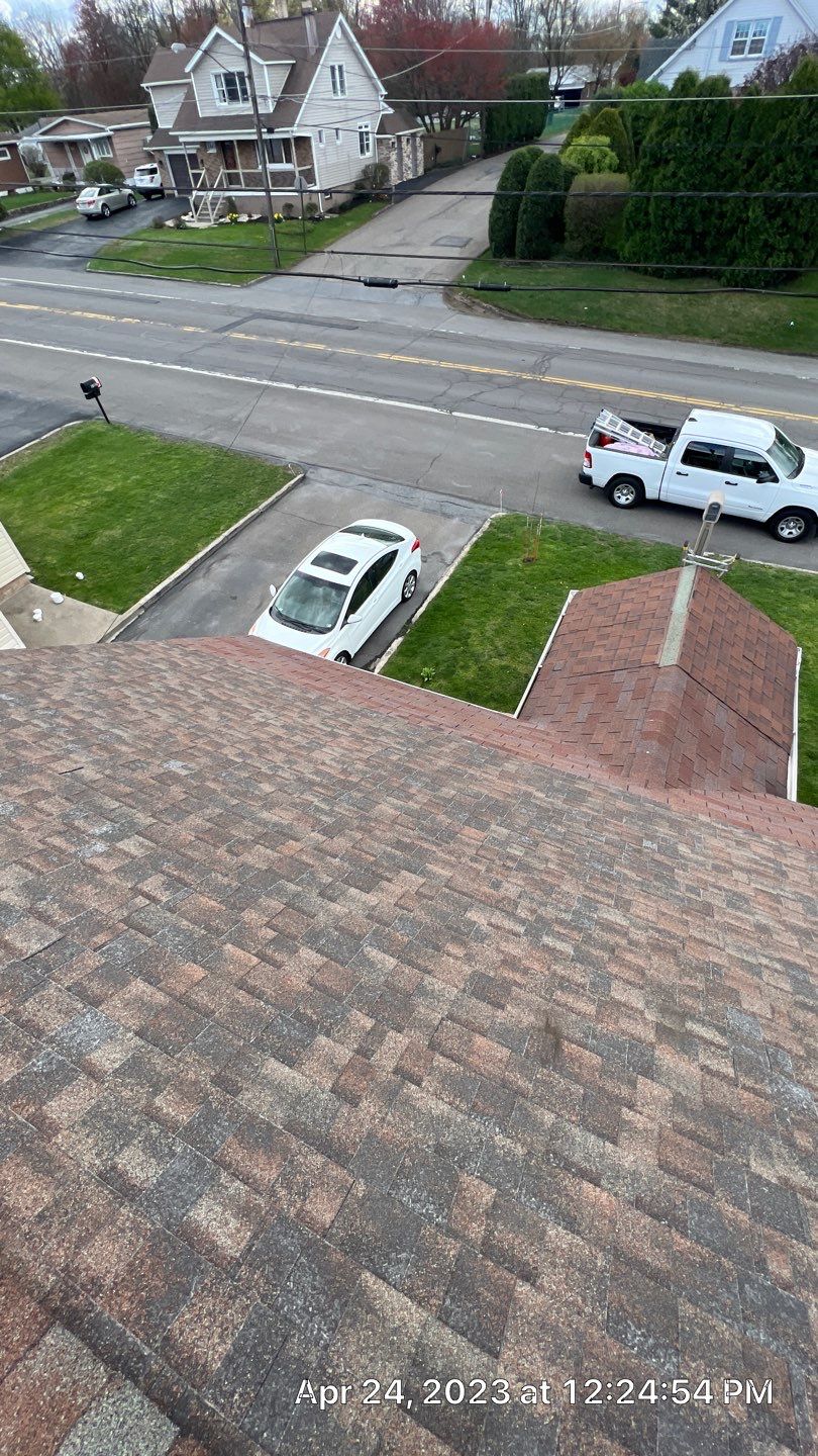 Estate Gray Shingles by Reimagine Roofing