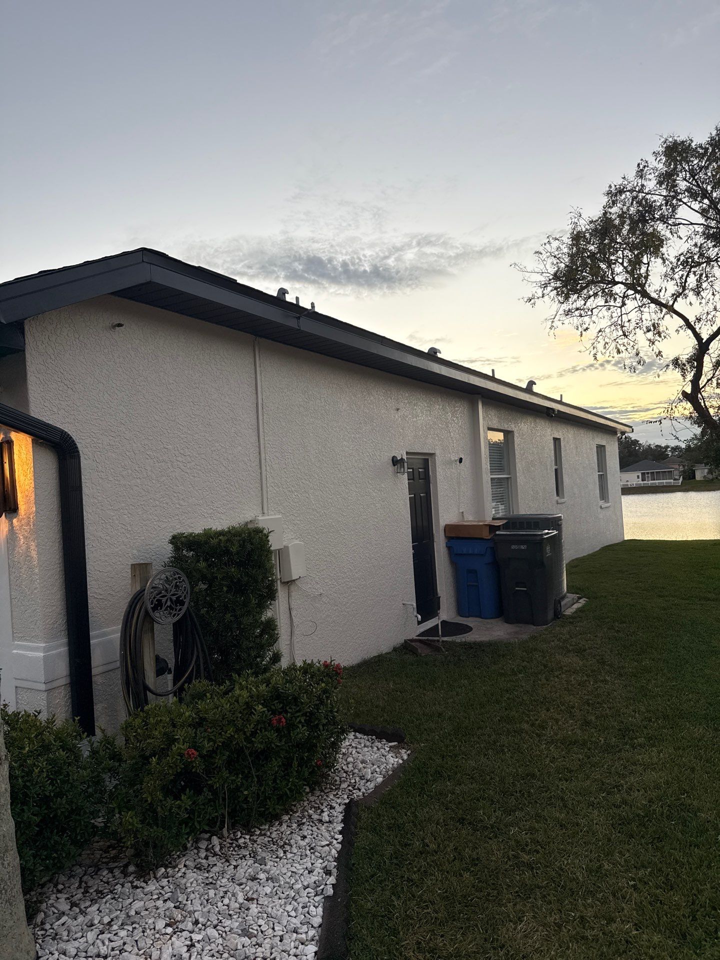 Black Aluminum Gutters with Matching Downspouts in Tampa FL by Gutter Professors