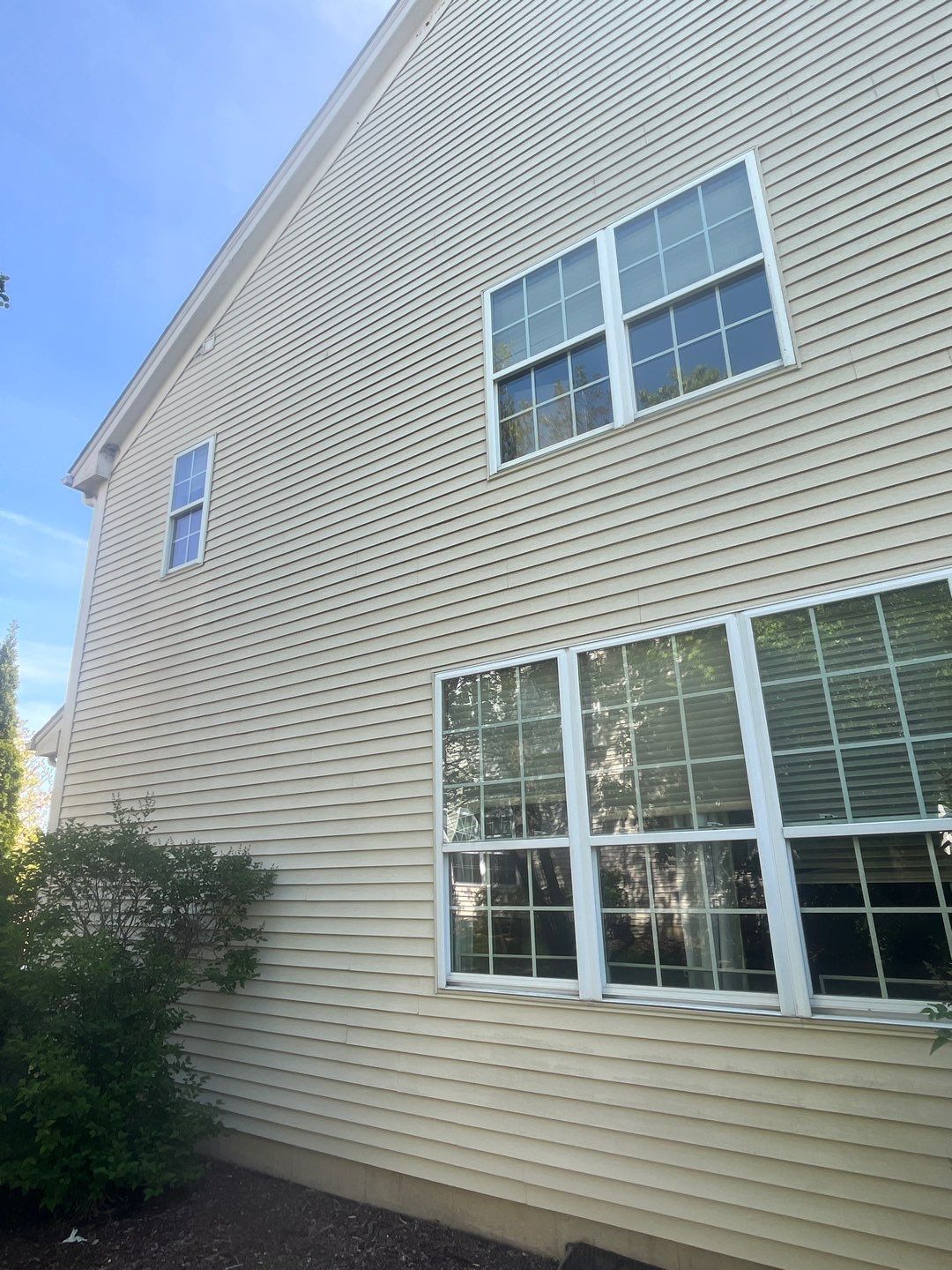Housewashing  using Algaecide, soft wash soap by Northern Power Washing LLC.