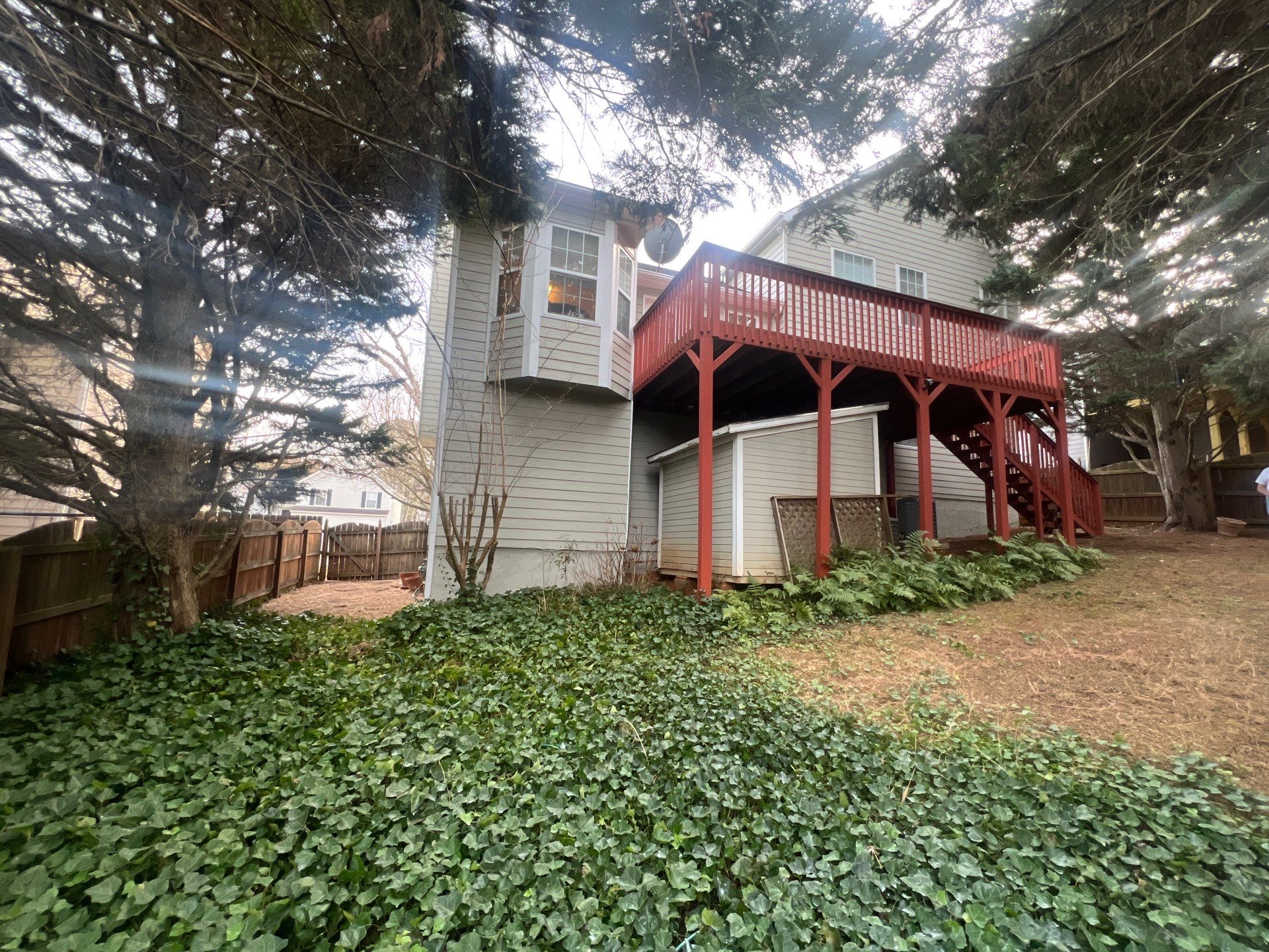 Exterior Residential Painting and Deck Staining in Kennesaw, Georgia by Swift Home Renovations