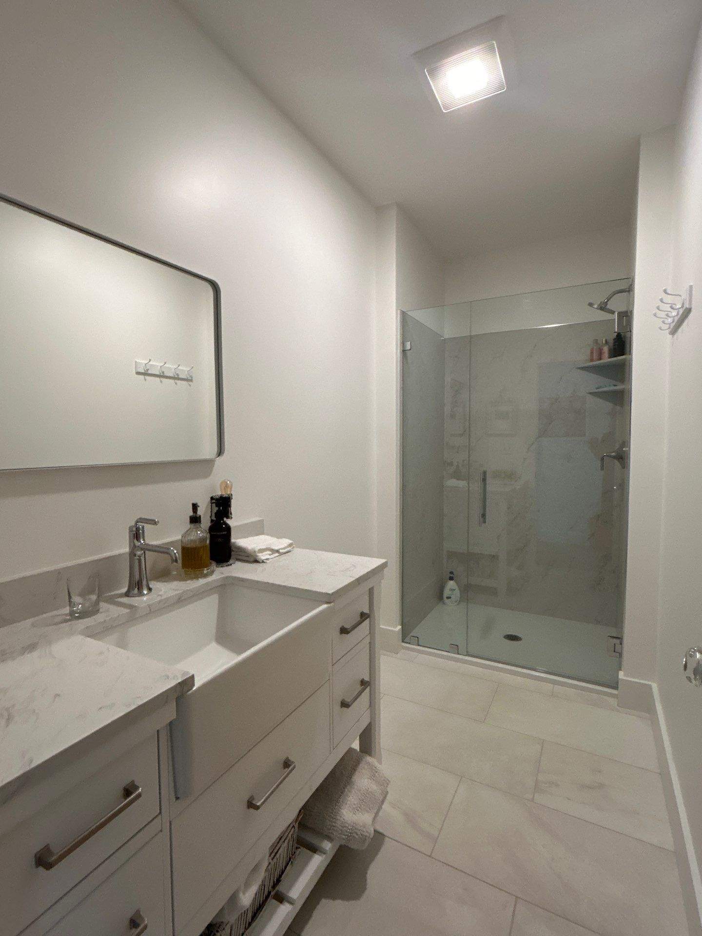 Frameless Showers and Custom Bathroom Mirror by Cheshire Glass Company