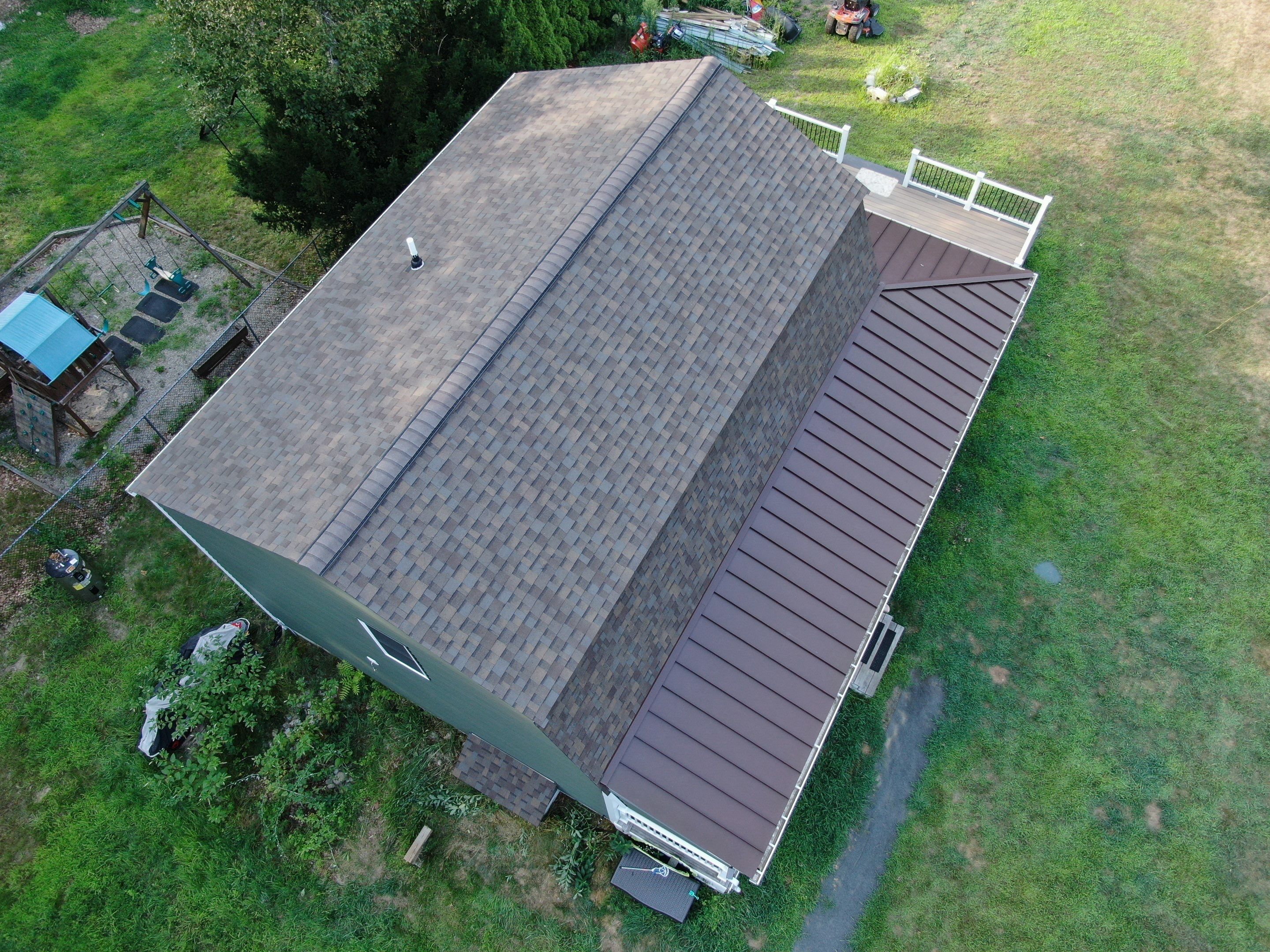 Full Roof Replacement & Farmers Porch Restoration – Asphalt + Standing Seam Metal by Mighty Dog Roofing of Greater Middlesex County