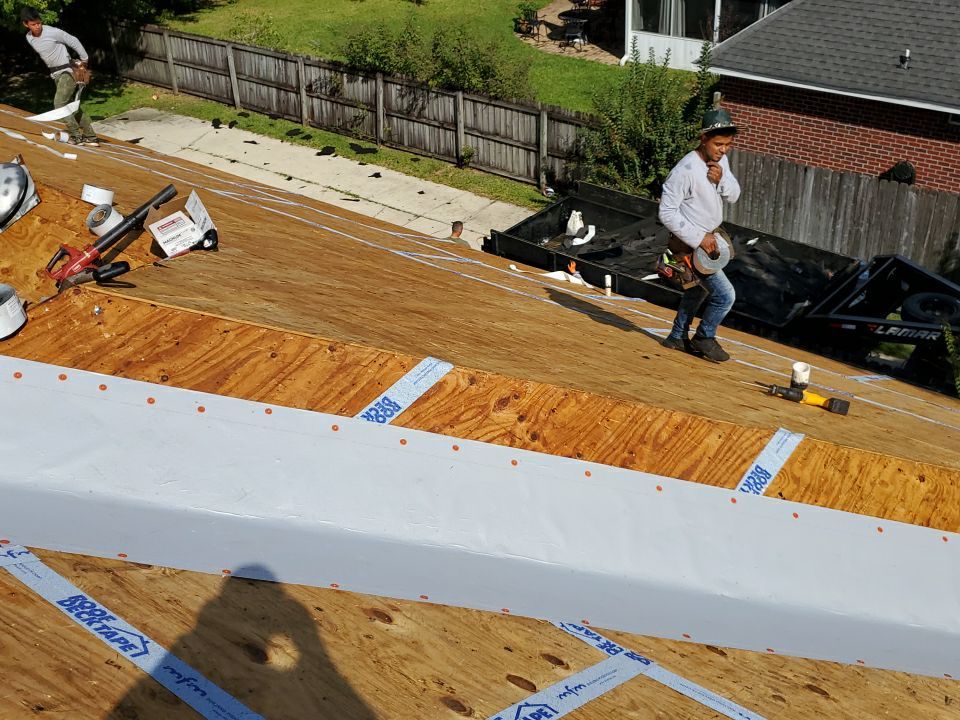 Residential Roofing Installation using Roof Replacement by American Roofing & Construction LLC