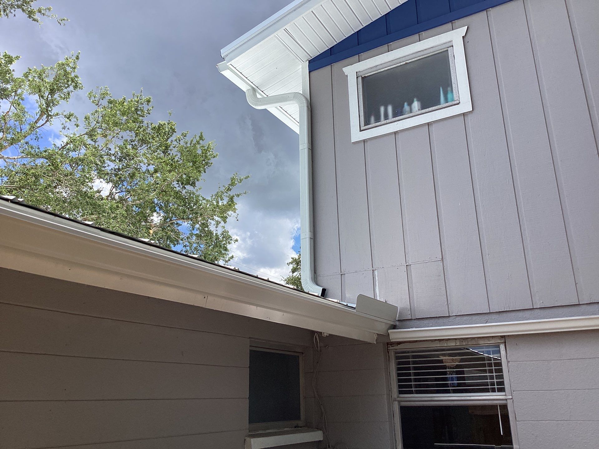 White K Style Seamless Gutters using 3X4 Elbow Downspout in Sarasota FL by Gutter Professors
