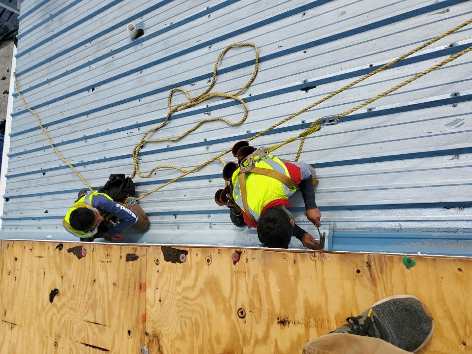 Commercial Roofing Installation using Metal roofing by American Roofing & Construction LLC