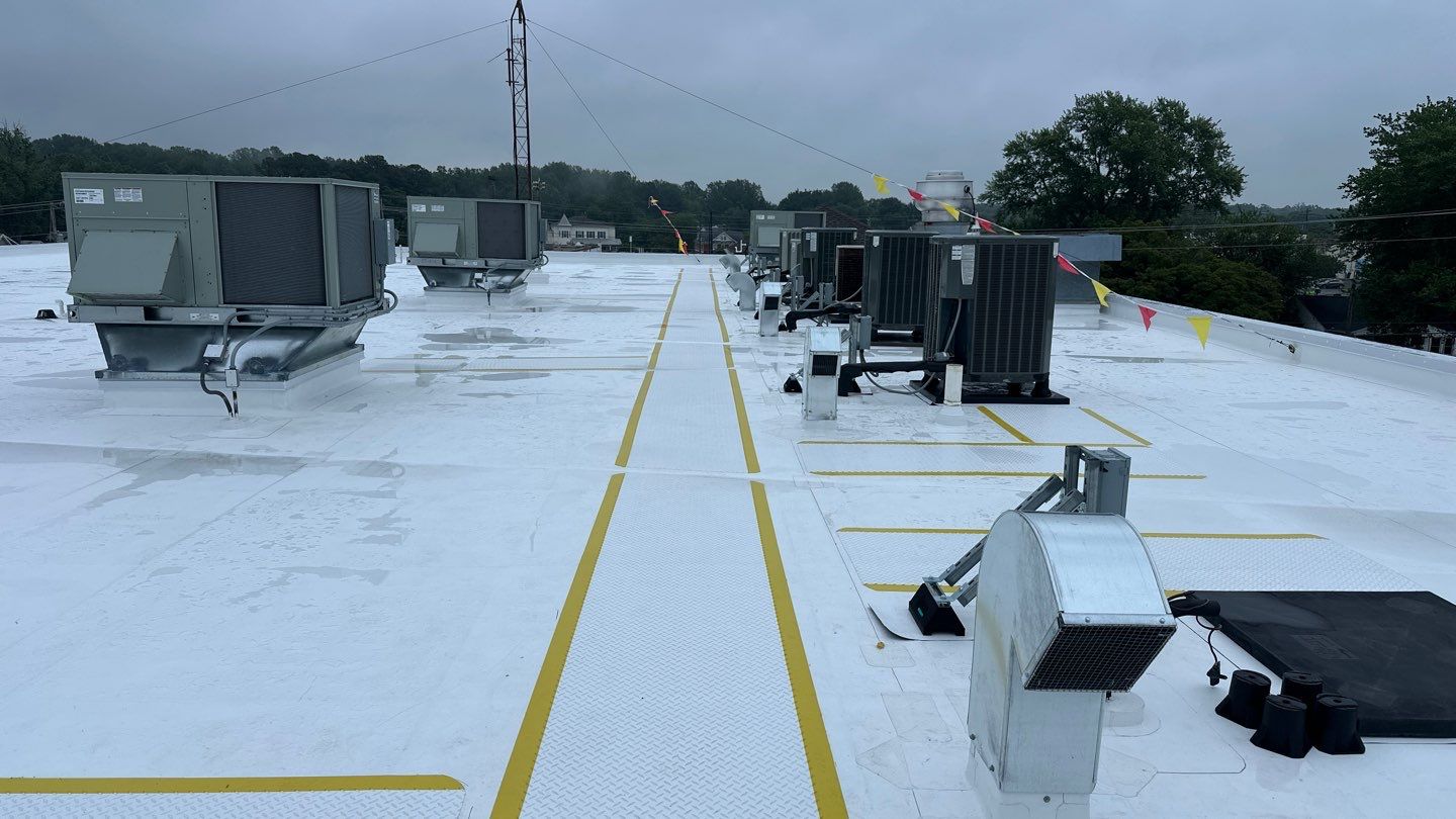 Roof Installation using Silicone TPO by ExteriorPros