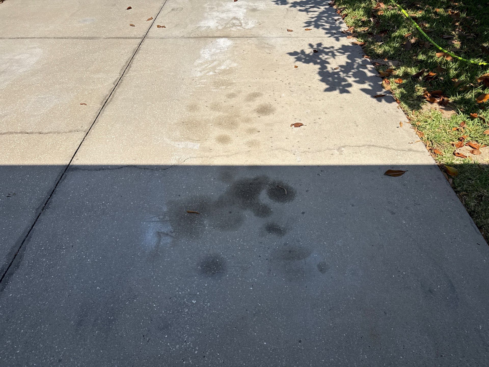 Concrete Driveway Oil Stain Removal | Harrison Ranch Community | Parrish, FL by Sunshine AquaWash