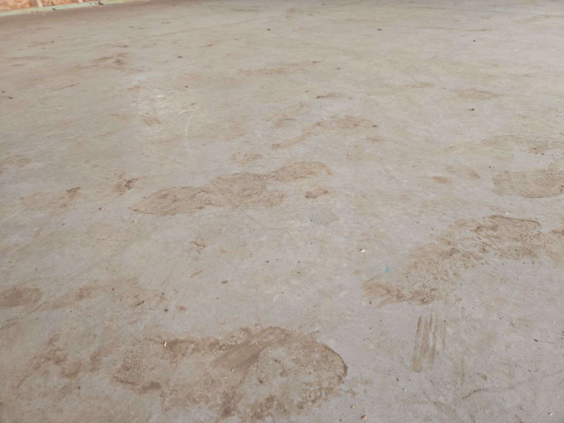 Speckled Epoxy Floor Coating for Large Shop in Rock Valley by Select Painting, Coatings & Garage Cabinets