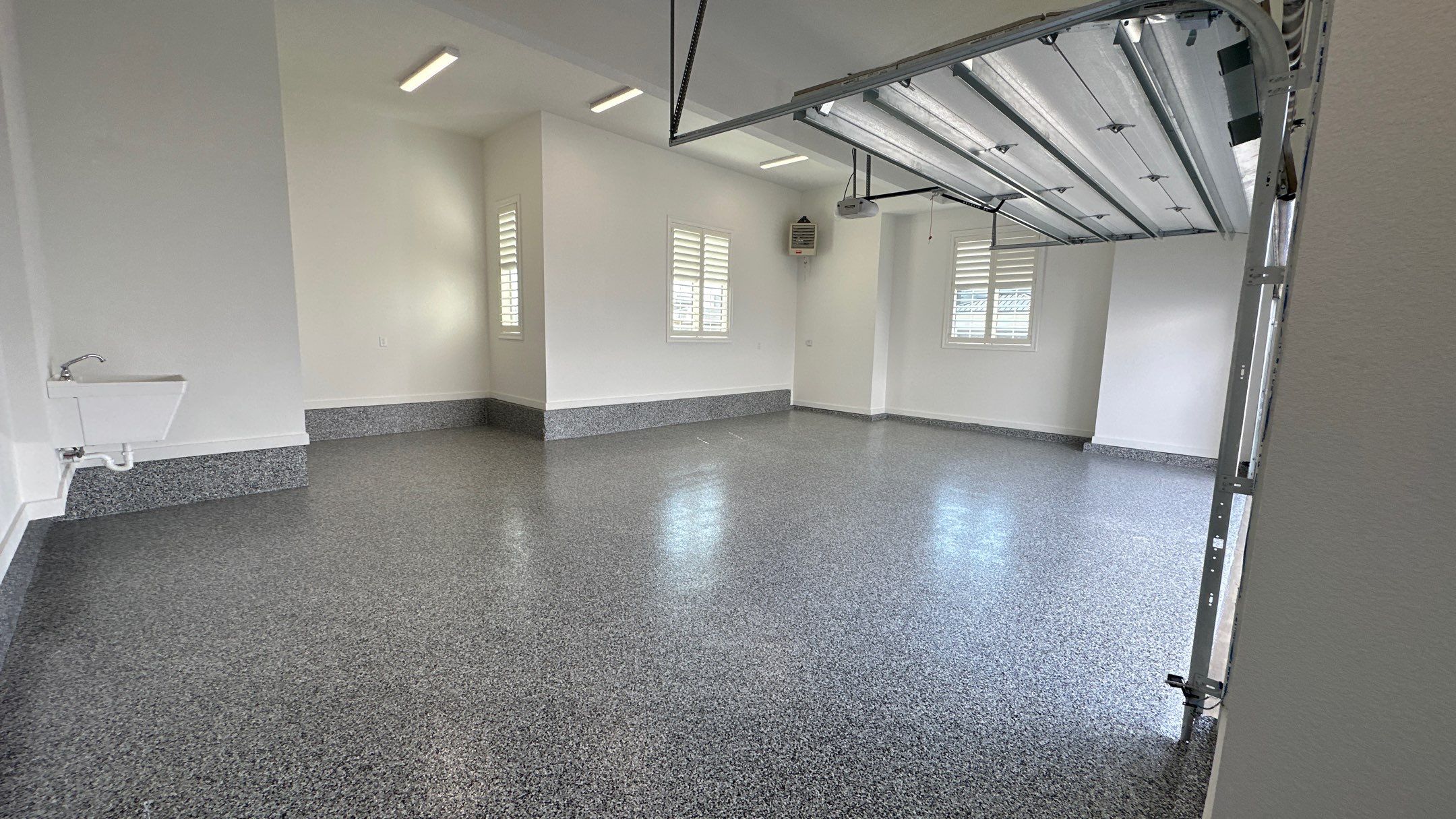 Mike & Pam transformed their garage with a Banner Garage Floor and Cabinets by Banner Garage