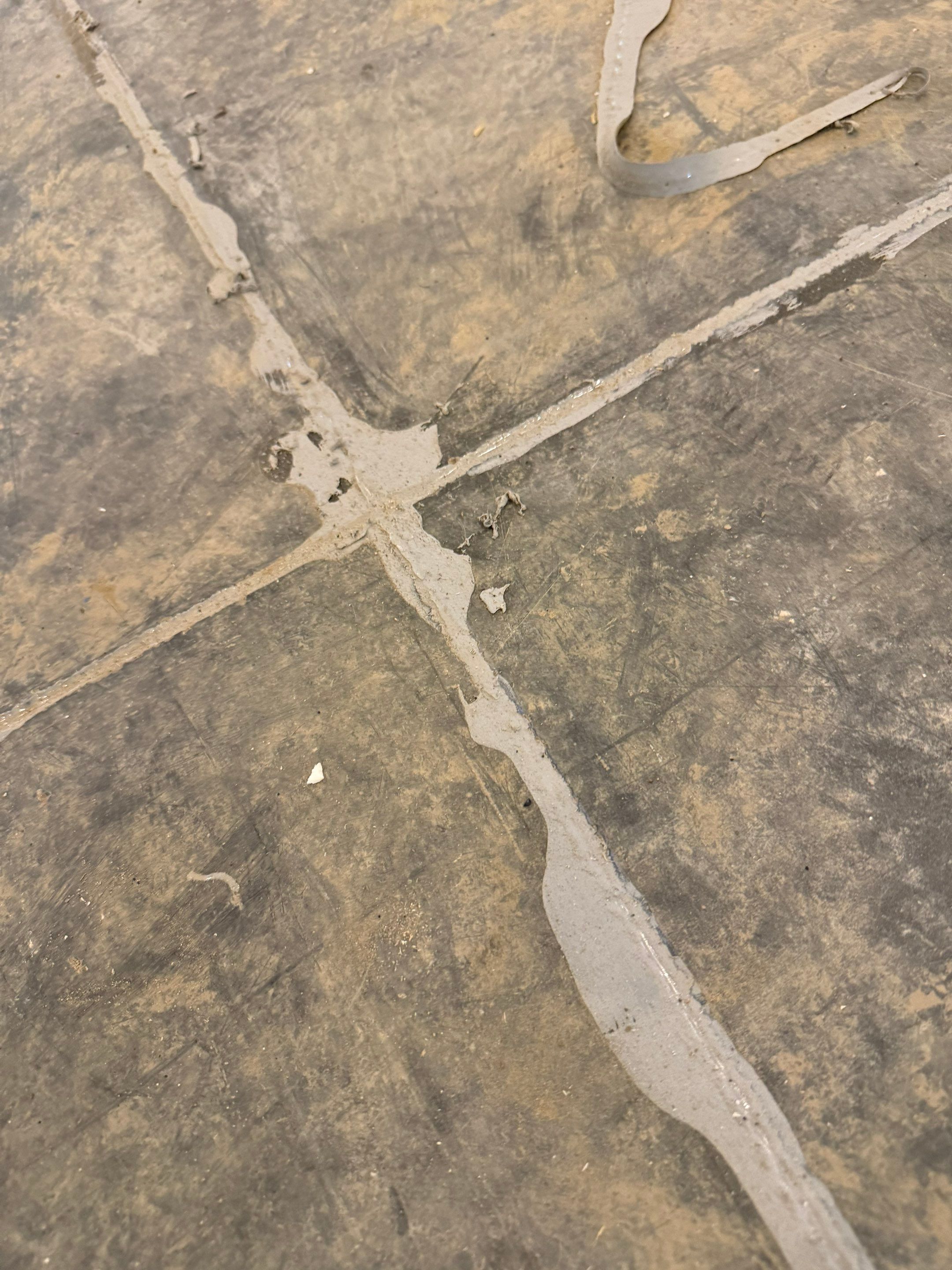 Multi-Car Garage Epoxy Floor Coating and Concrete Finishing in Sioux Falls by Select Painting, Coatings & Garage Cabinets