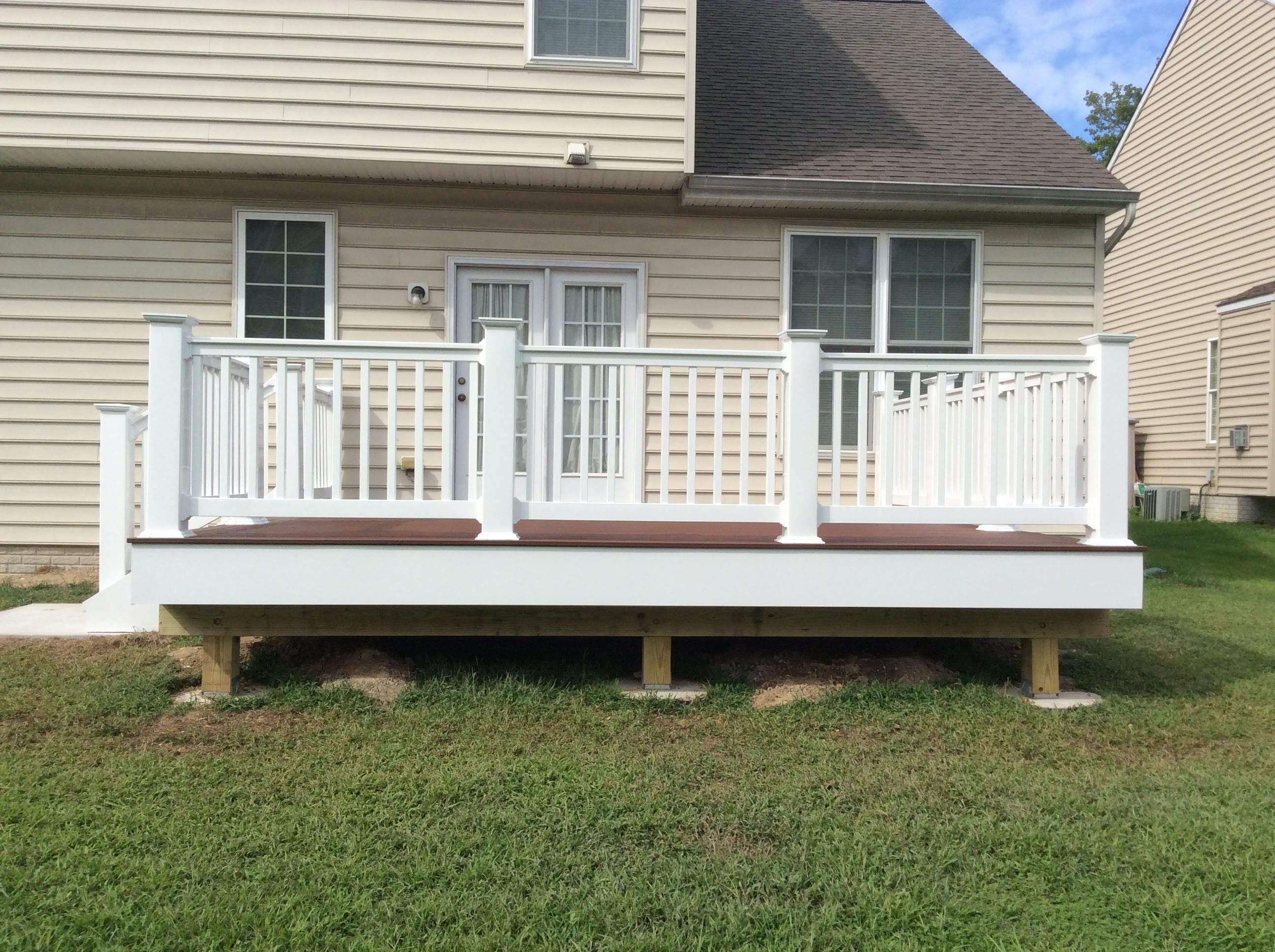 Deck Installation using New Composite Deck Board by Alpha Design Services