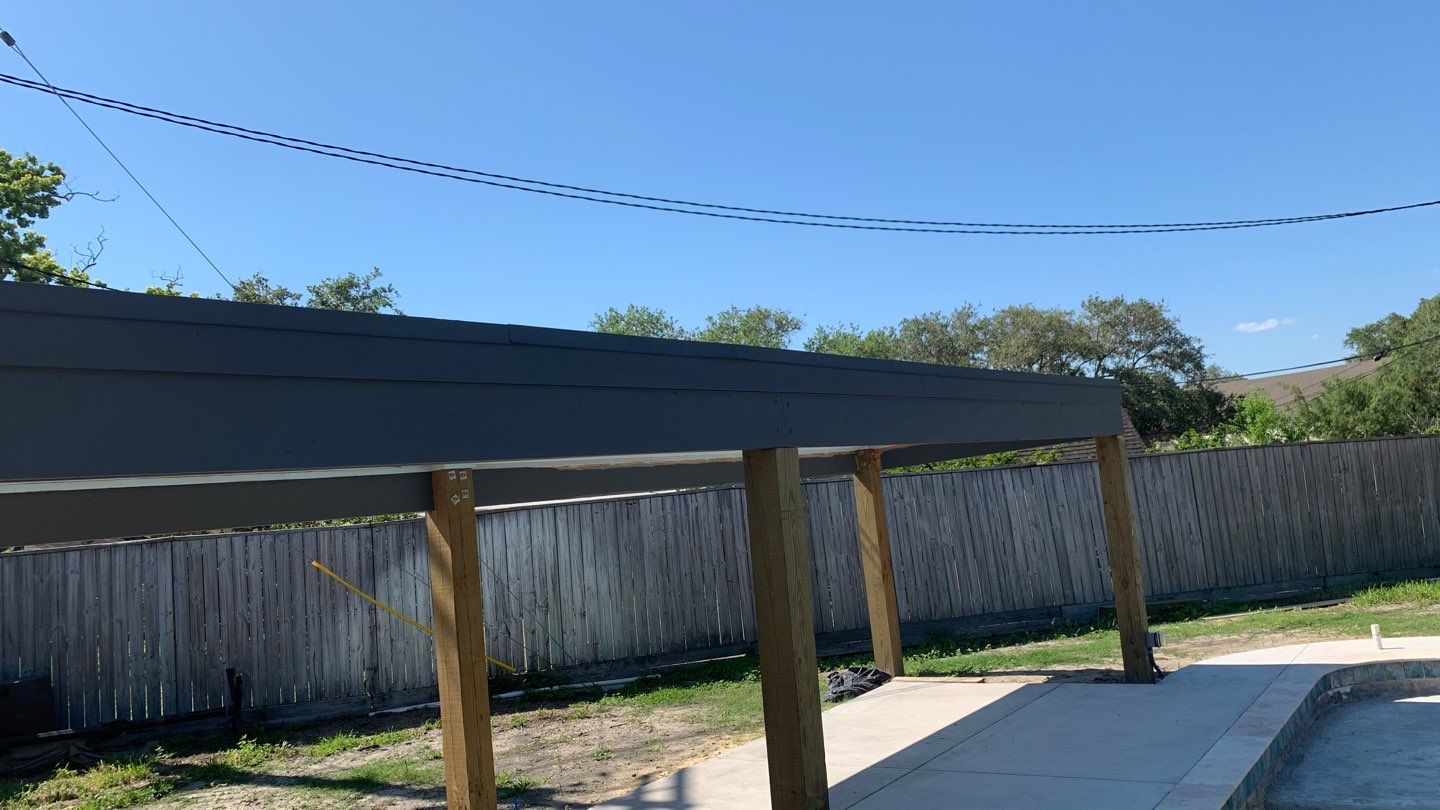 Beautiful pool side build by Bayfront Roofing and Construction