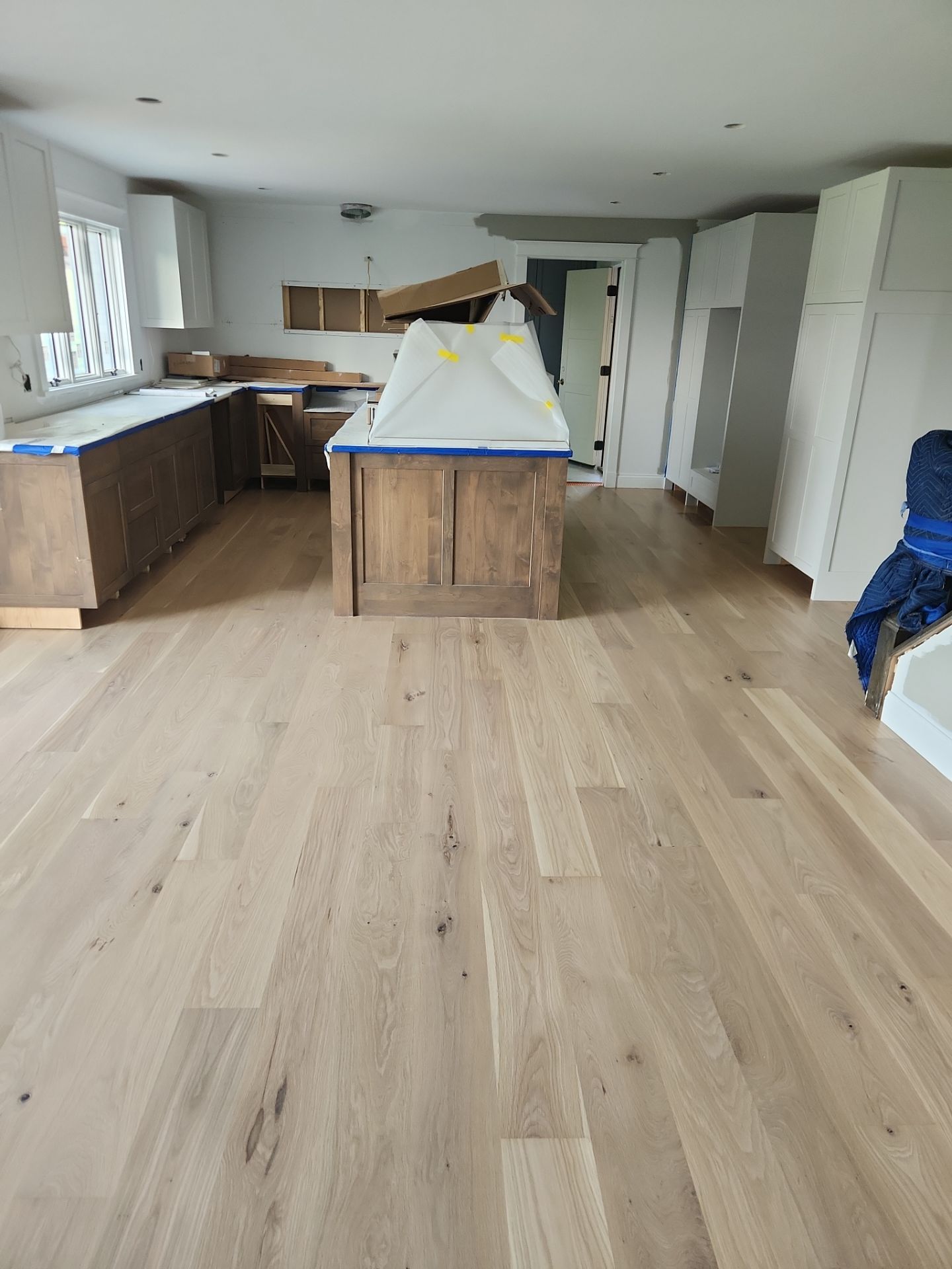  7 inch wide engineered  White Oak site sand and finish by Ann Arbor Hardwoods 