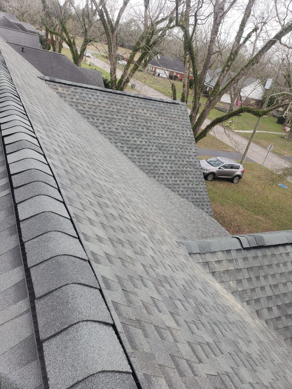 Residential Roofing Installation using Roof Replacement by American Roofing & Construction LLC