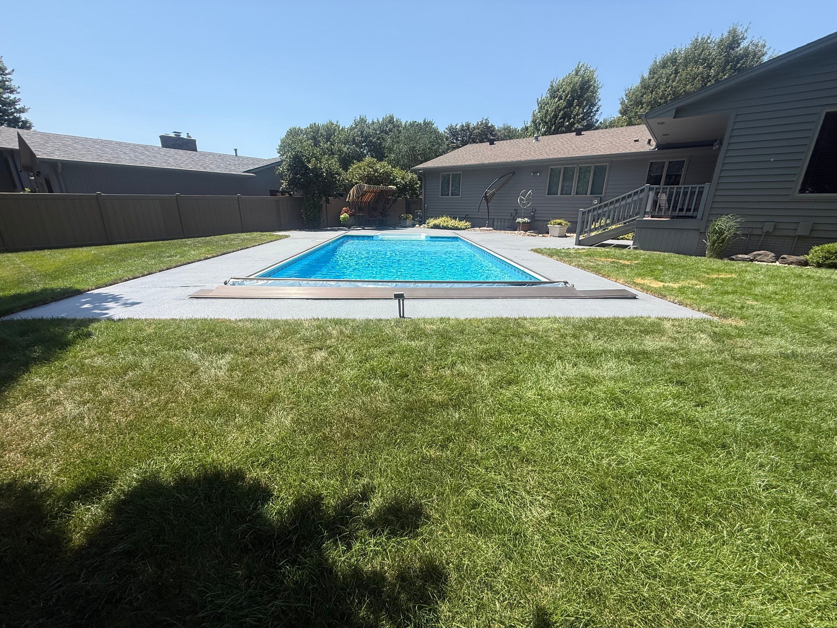 Residential Pool Deck Resurfacing in Sioux Falls by Select Painting, Coatings & Garage Cabinets