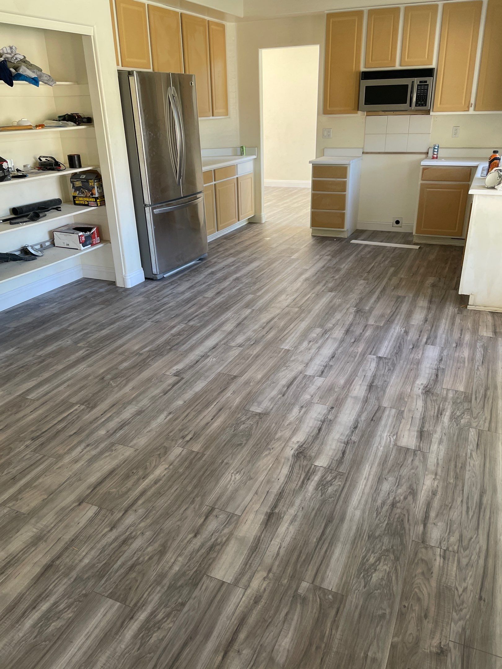 Laminate Staircase and Flooring  by Footprints Floors of Chandler 