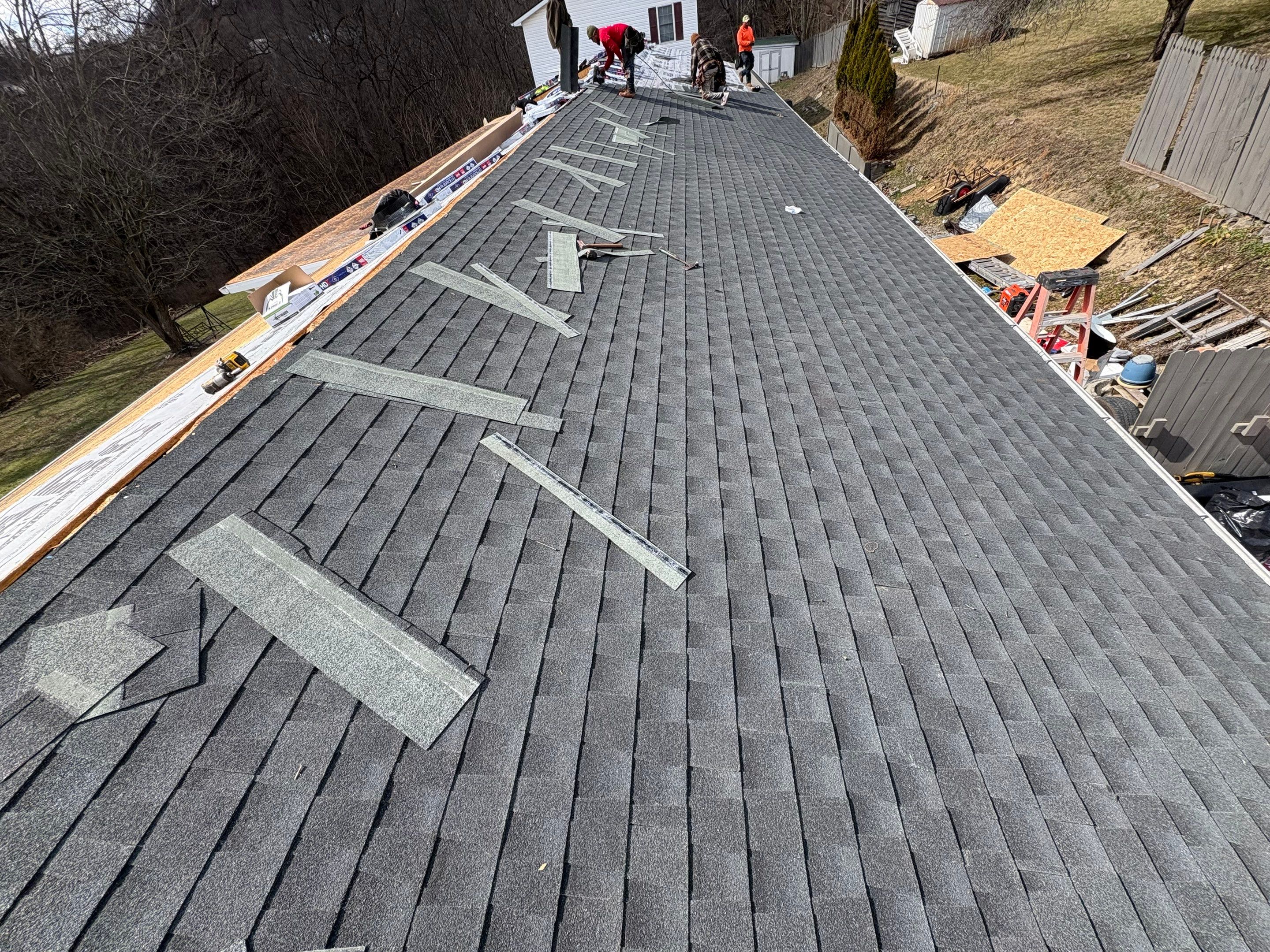 Residential Roofing Installation using GAF Timberline HDZ Charcoal by Rainstoppers Roofing