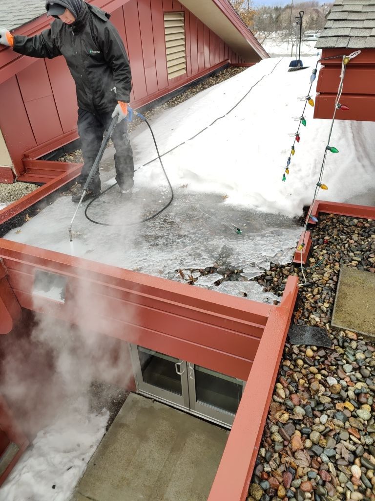 Roof Steaming in Plymouth by Next Level Seamless Gutters / Exteriors Inc.