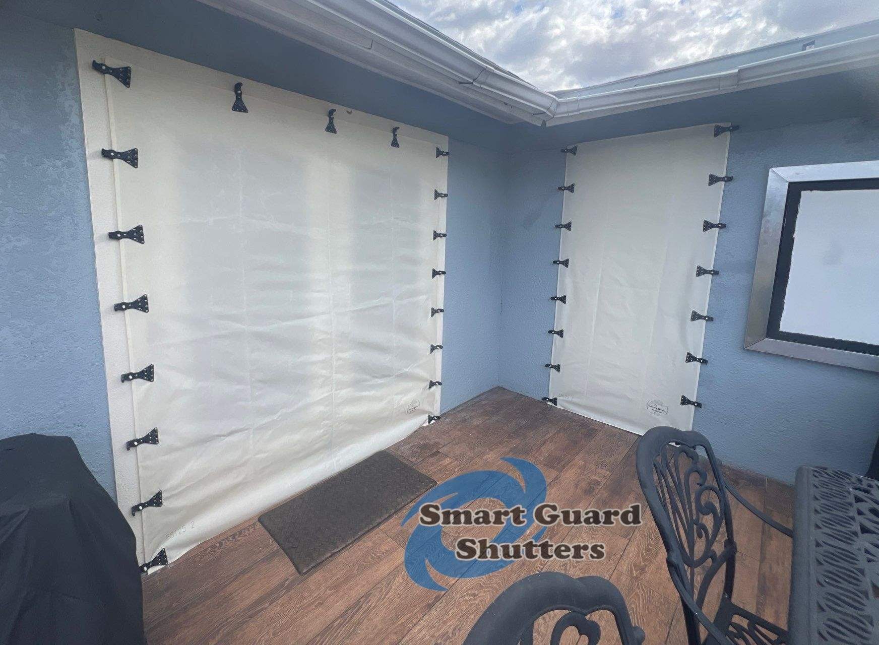 Hurricane Protection in Blue Grey by Smart Guard Shutters