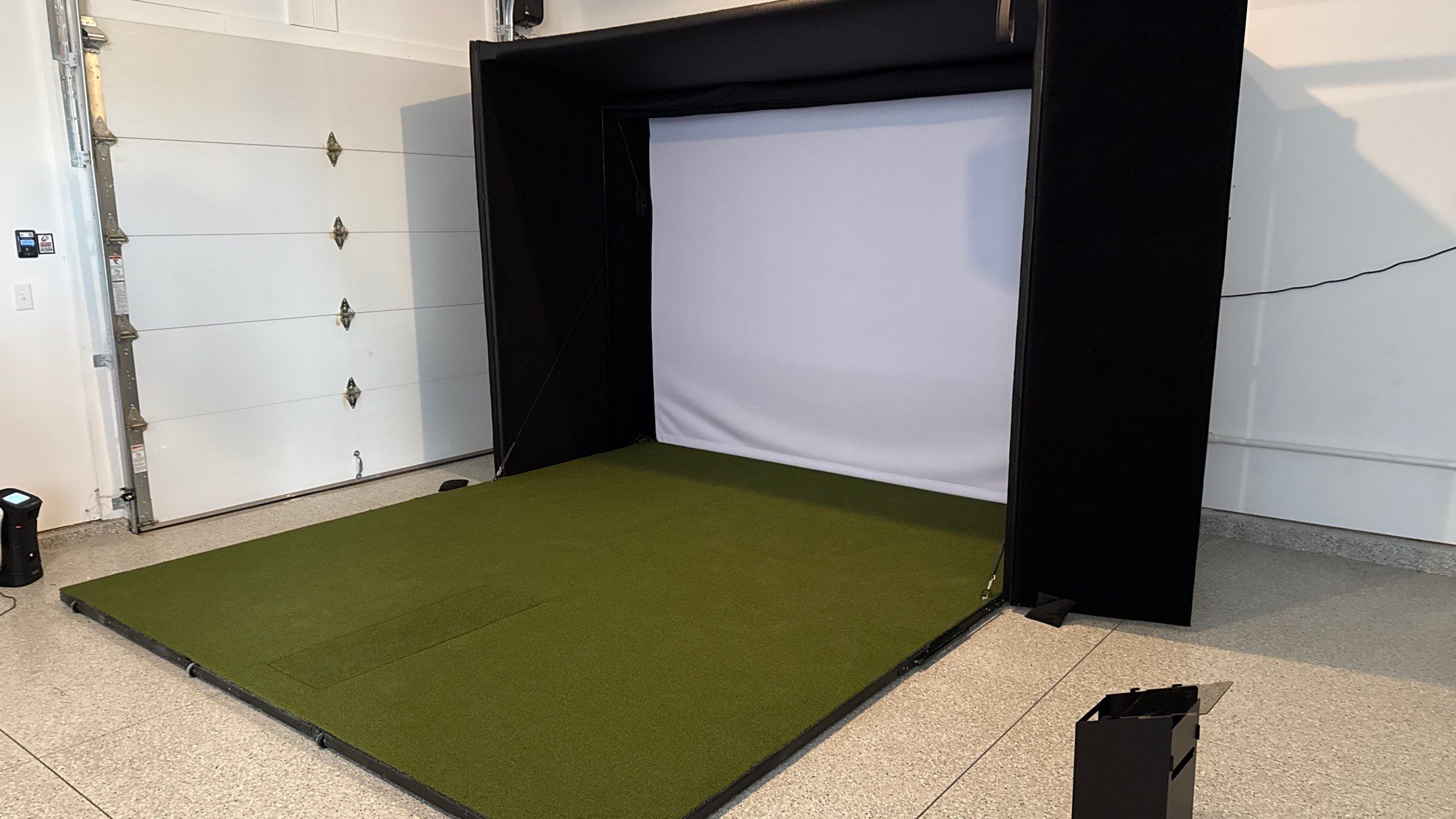 Ben Took It To The Next Level With a Golf Simulator by Banner Garage