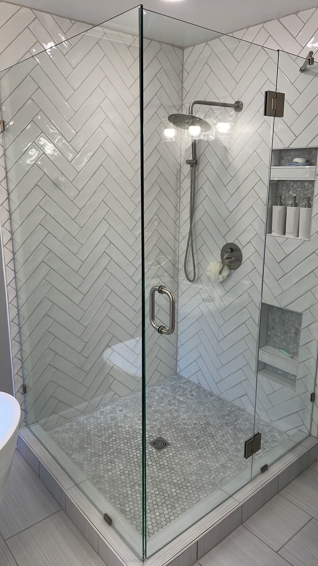 Bathroom Remodel using Schluter by Footprints Floors of Coastal Carolina