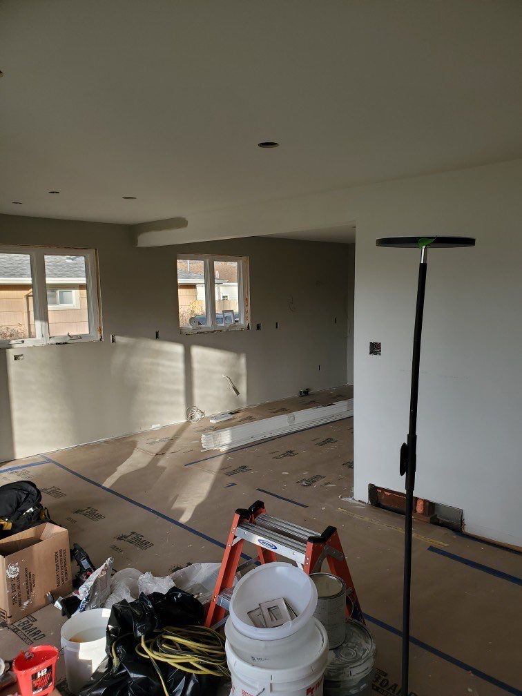 Interior Renovations, Kitchen Remodel, and Window Replacement by Ivy Lea Construction