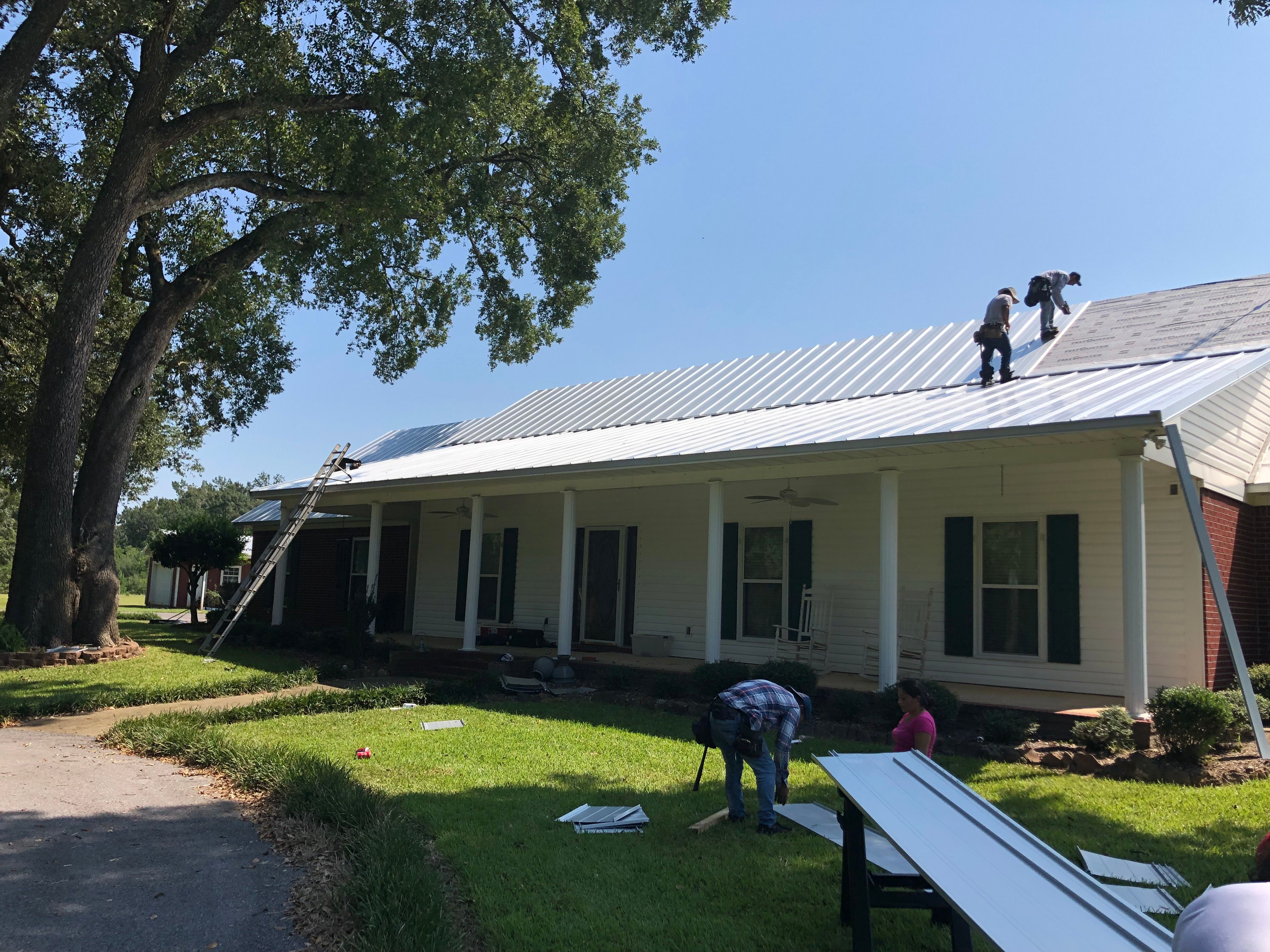 Residential Roofing Installation using Metal roofing by American Roofing & Construction LLC