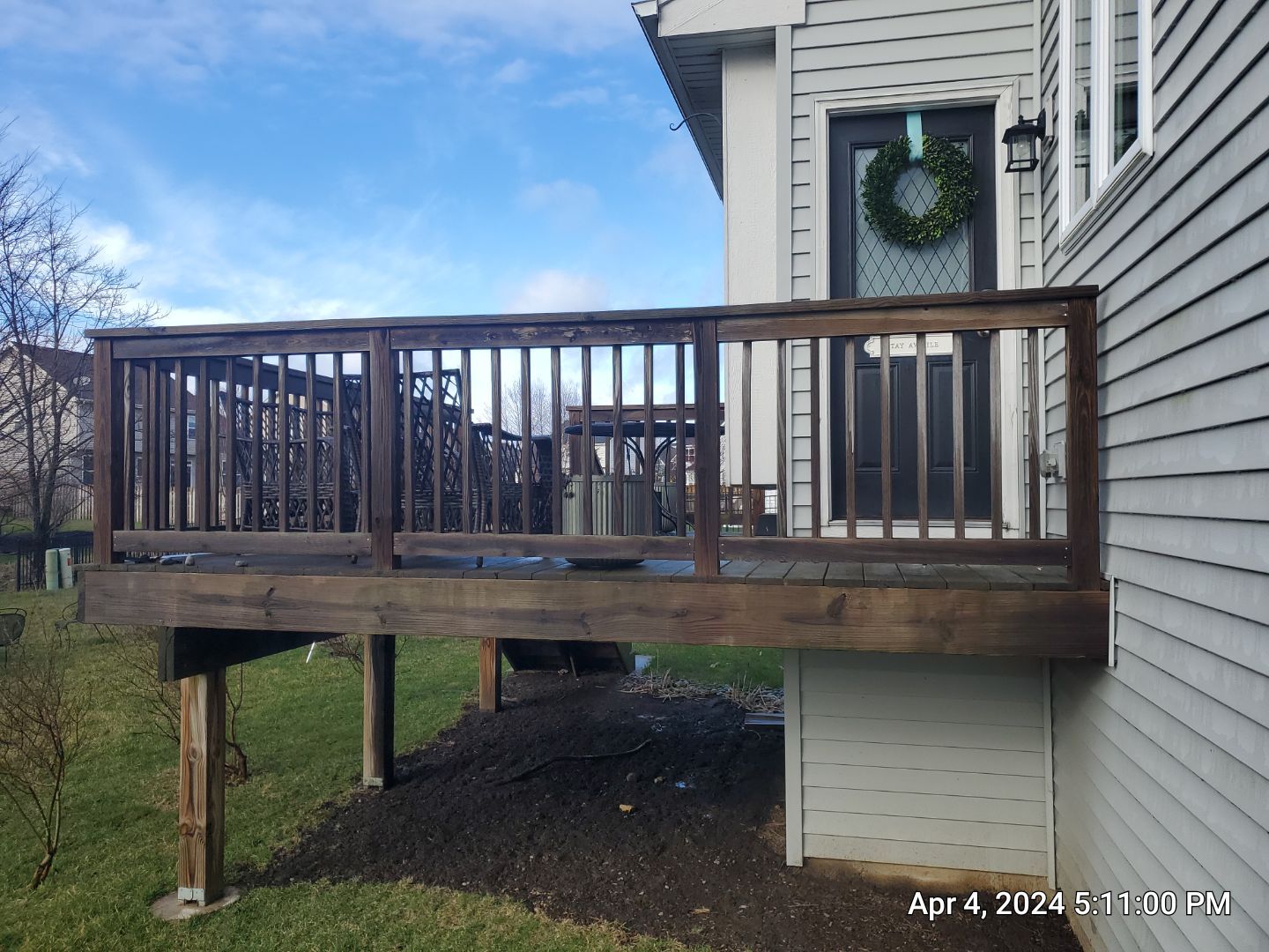 wood deck cleaning and staining by Northern Power Washing LLC.