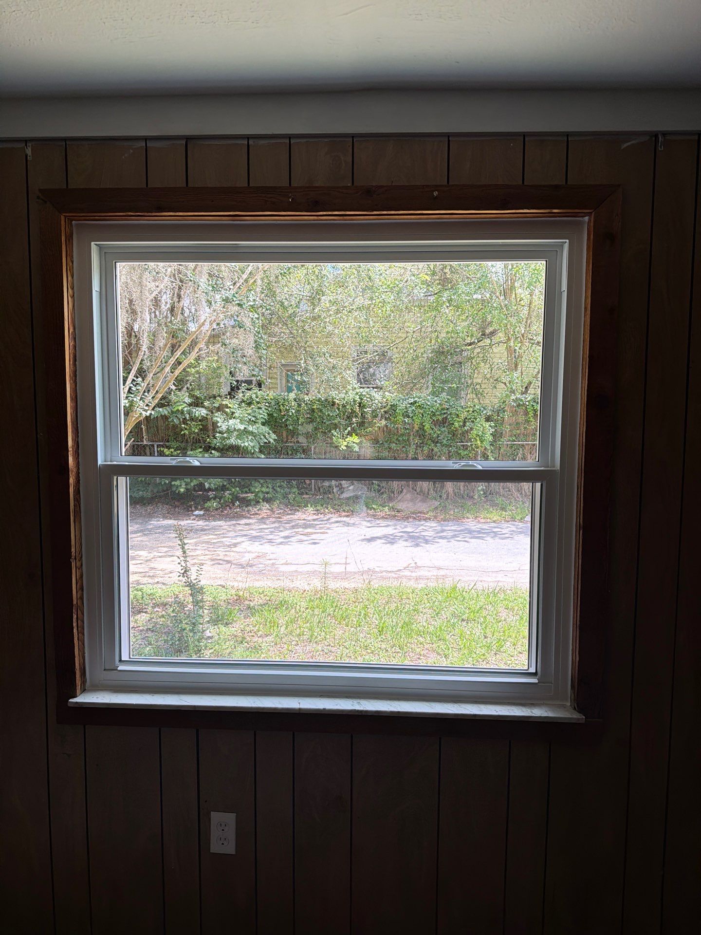 White Vinyl Window Replacement for Residential Home in Williston by Windows & Doors Store