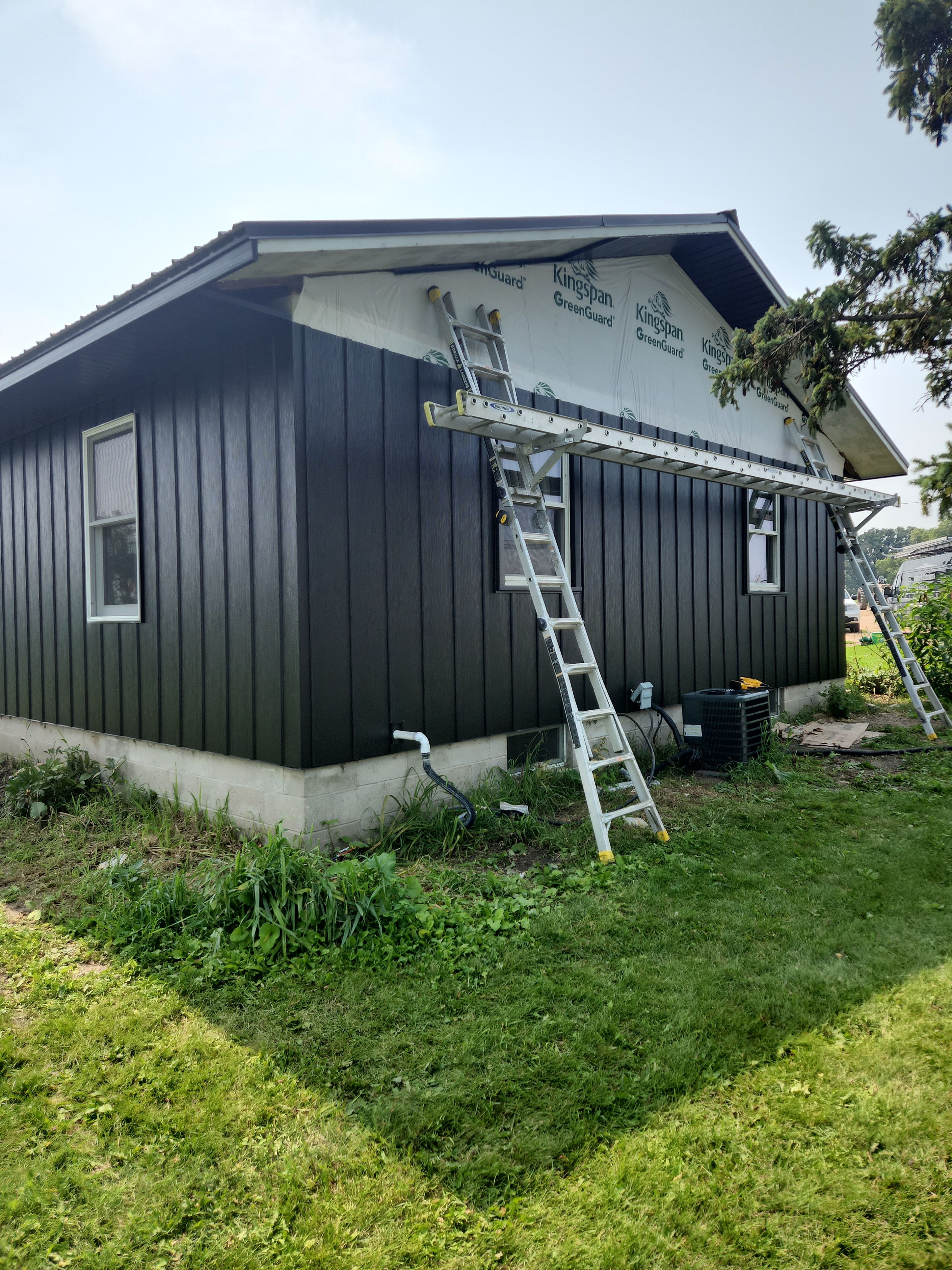 EDCO Steel Siding with Black Fascia & Soffit – Waverly, MN by Next Level Seamless Gutters / Exteriors Inc.