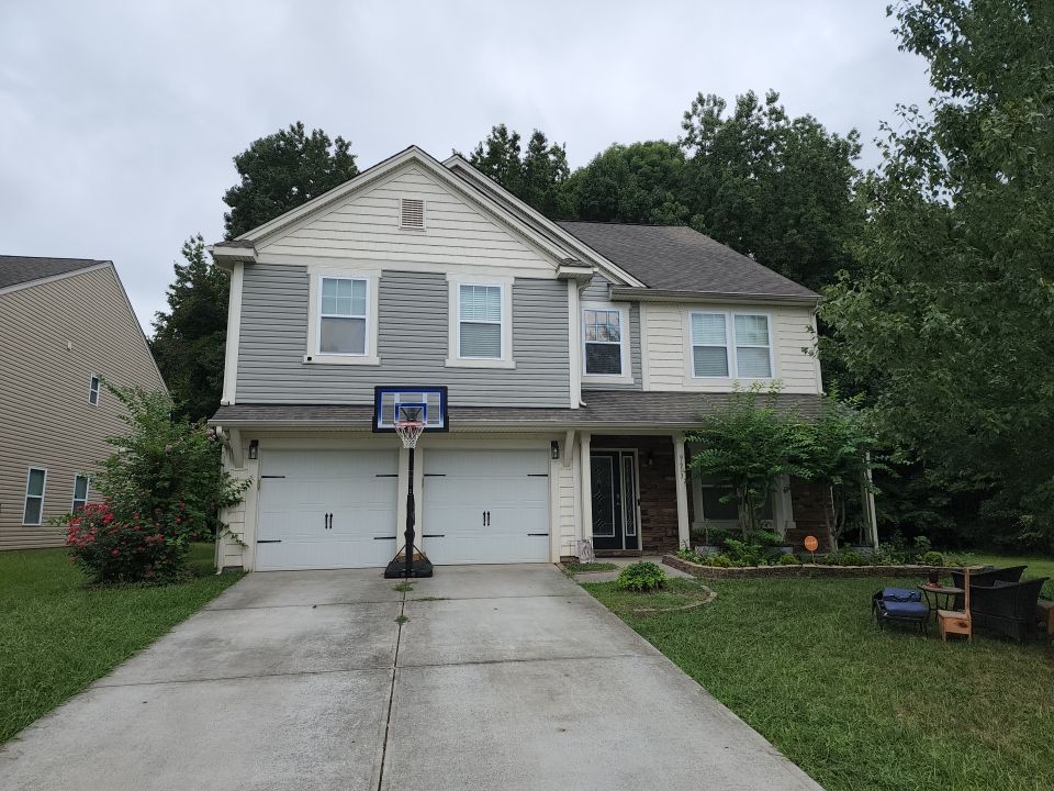 House Wash using cleaner by Power Wash Masters LLC
