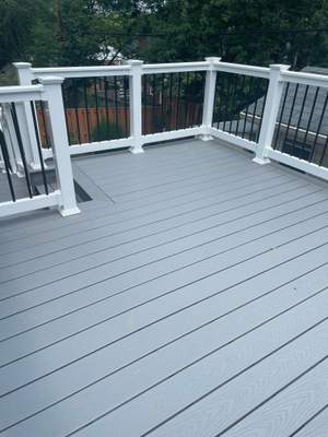 Deck resurfacing, railing replacement and concrete resurfacing