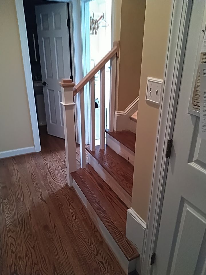 Stairway Installation using Red oak modern railings by House Custom Carpentry, LLC