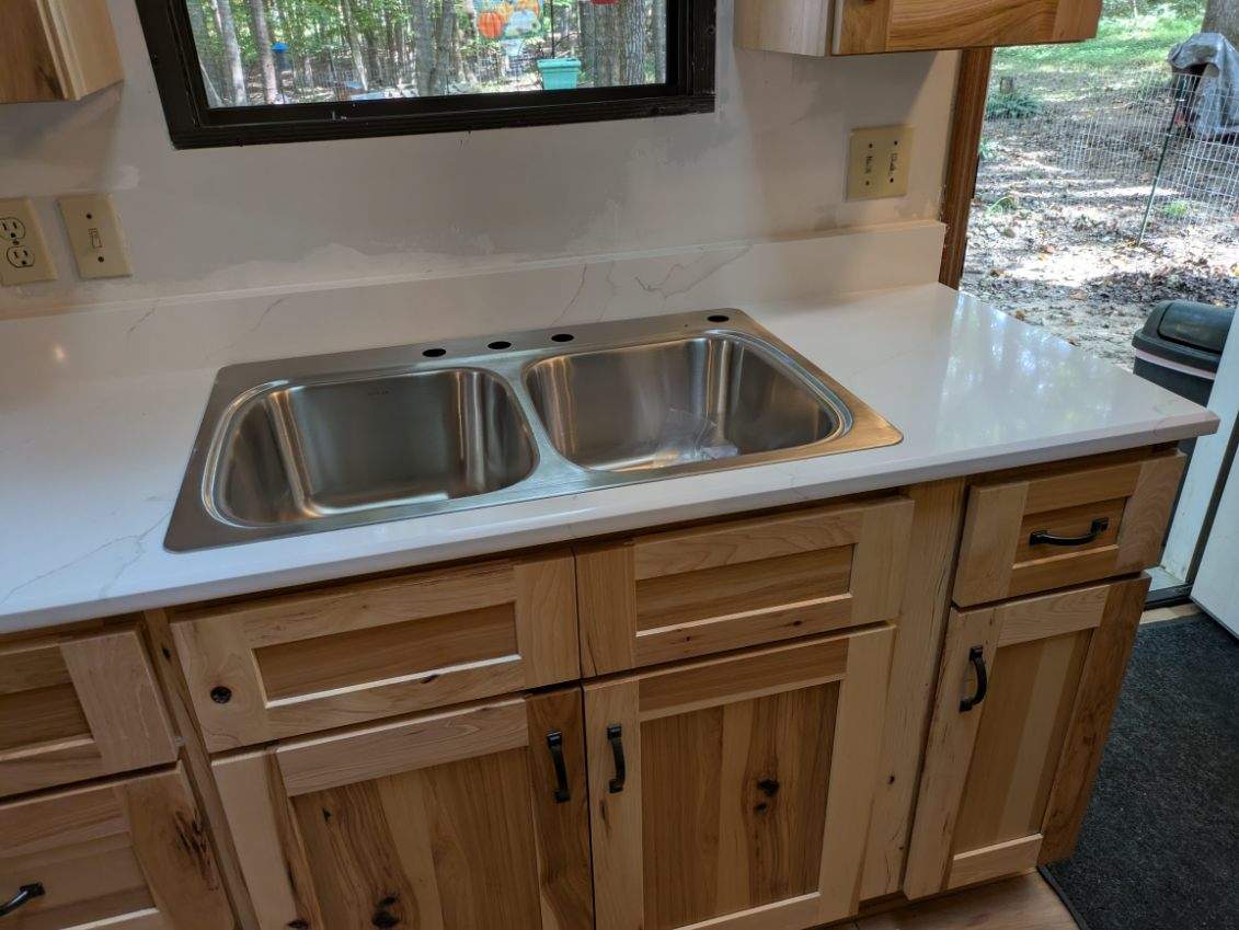Stunning Kitchen Transformation with Raw Hickory Cabinets by A Step Above Handy LLC 