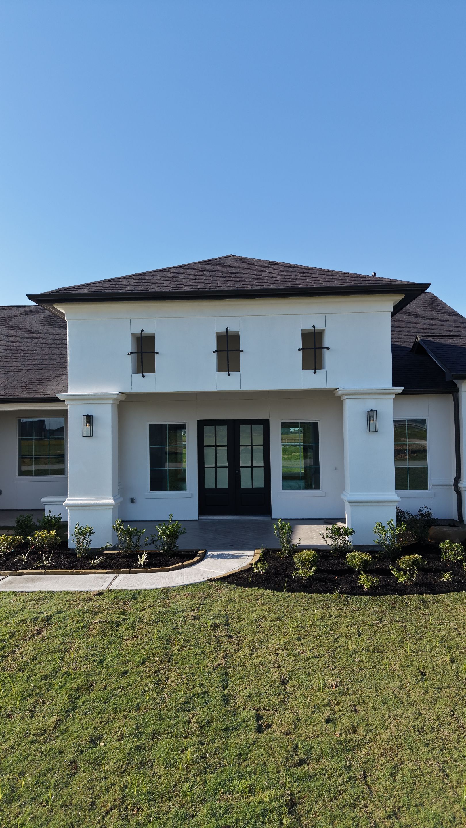 Custom Stucco Masterpiece with Precision Foam Detailing – Waller, TX by Apex Conventional Stucco Llc