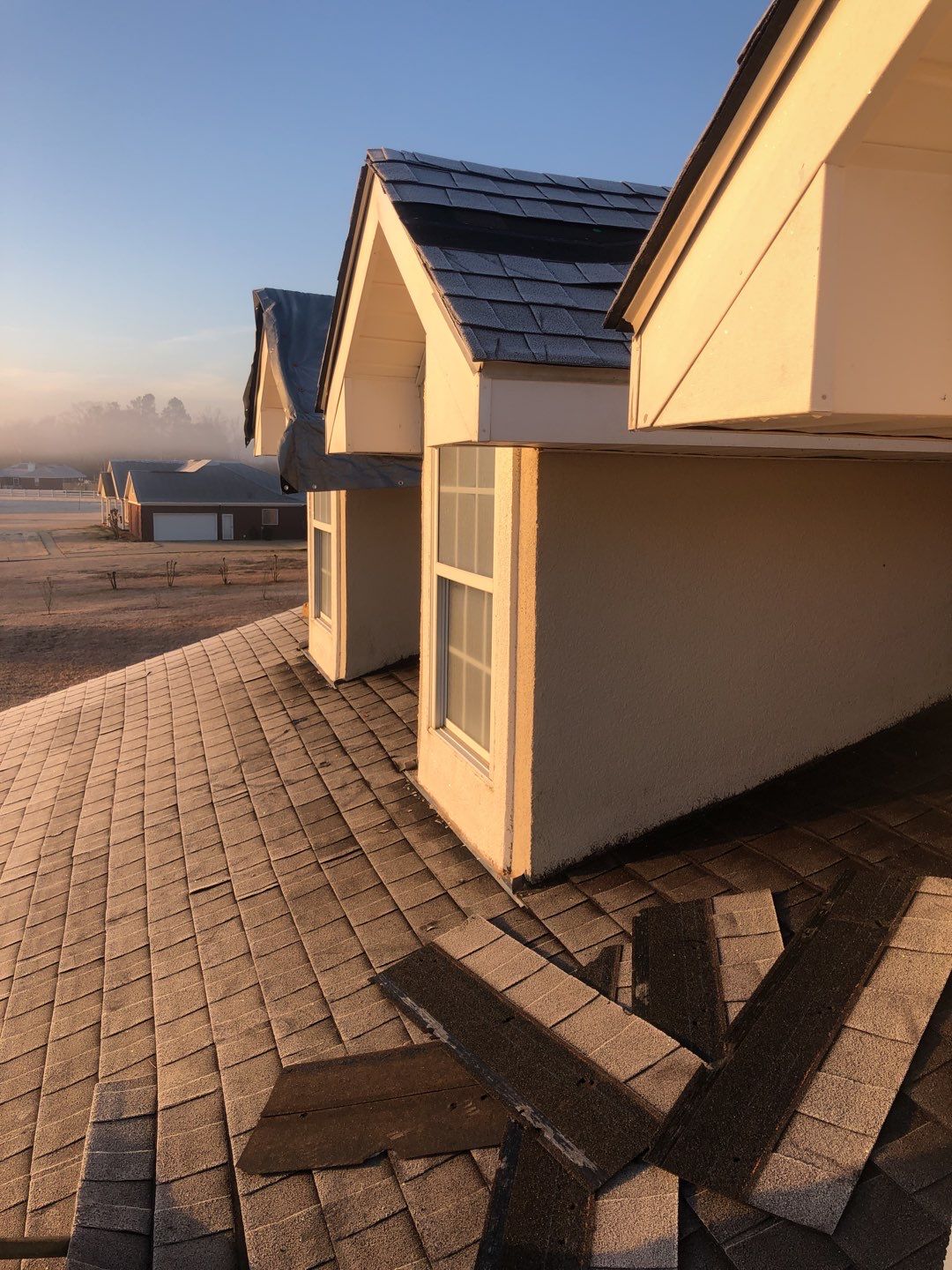 Residential Roofing Installation using Roof Replacement by American Roofing & Construction LLC