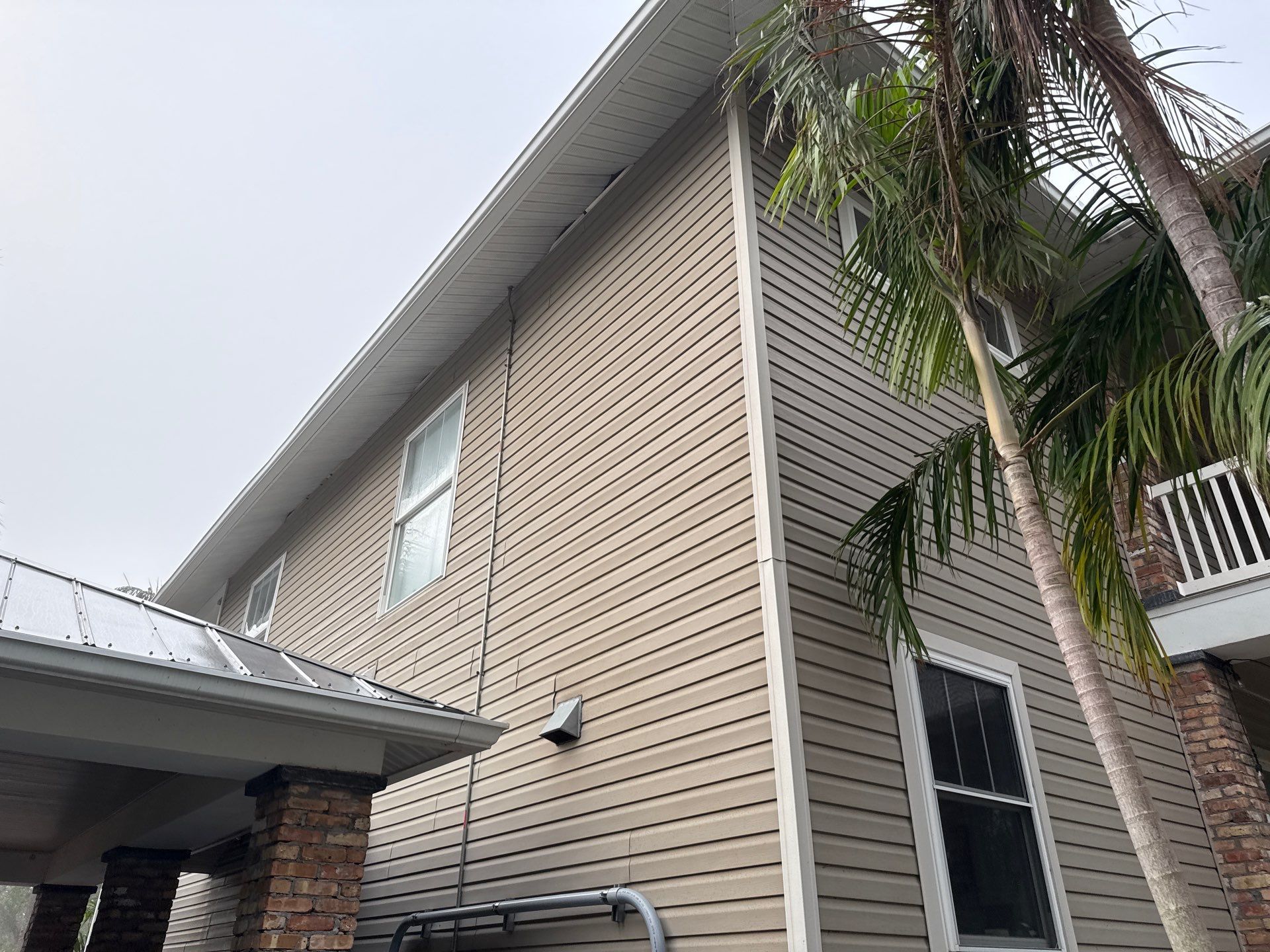 2-Story House Wash and Garage Pressure Washing in Palmetto, FL by Sunshine AquaWash