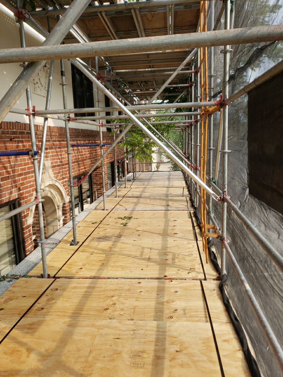Asphalt Roof Replacement with Aluminum Gutter Installation by Custom Installations